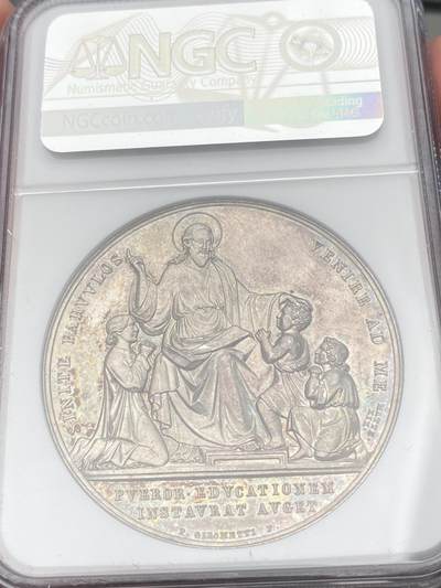 万国钱币拍卖第058期（万国新年大拍） NGC MS63 1854年梵蒂冈教皇国庇护九世纪念在罗马设立教宗幼稚园纪念大银章 高浮雕晚霞彩极美 耶稣和蔼的为小孩童送上祝福 