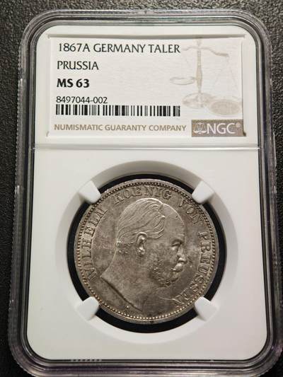 【德藏】世界币章拍卖第159期(元旦专场拍卖) - 1867年 德国普鲁士威廉一世泰勒银币 NGC MS63 原味淡包浆不失原光 这枚属于德意志关税同盟泰勒体系，1857年德意志关税同盟确定该银币为统一流通货币，含银量为16.66克（900银），“XXX EIN PFUND FEIN”表示30枚该银币含1磅纯银“VEREINSTHALER”即“联合泰勒”1867年正值北德意志邦联成立这枚是普鲁士主导德意志统一进程中的流通货币,兼具经济与历史象征意义