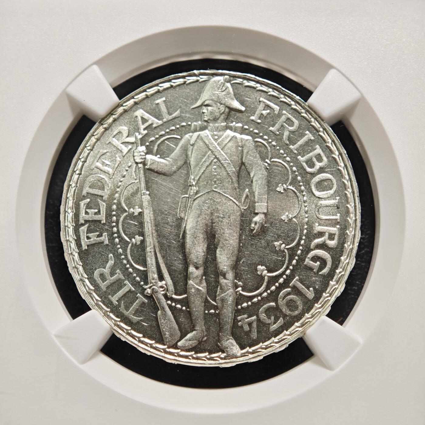 【德藏】世界币章拍卖第159期(元旦专场拍卖) 1934年 瑞士弗里堡州联邦射击节5法郎纪念银币 NGC MS63 原光犀利 1934年弗里堡射击节银币发行于二战前夕，因时代背景特殊且发行量有限，是瑞士射击节纪念币中的热门品类