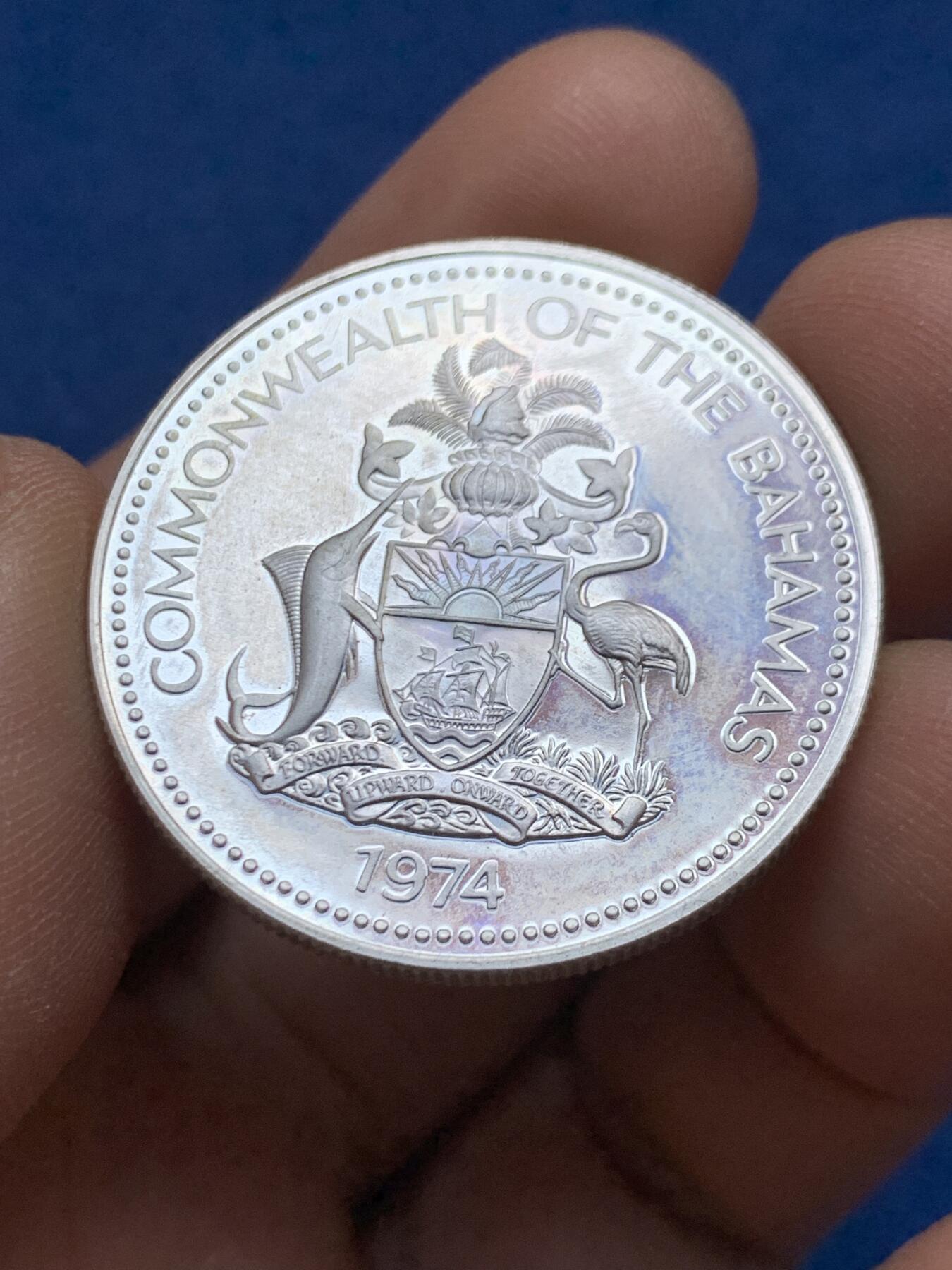 《竞宝斋》第452场 周日，周一 2场连拍 （全场包邮，欢迎送拍） 巴哈马1974年海螺1元精制银币 800银 18.3g