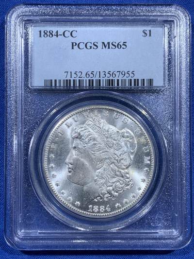 《竞宝斋》第452场 周日，周一 2场连拍 （全场包邮，欢迎送拍） - PCGS MS65 美国 1884 CC 摩根 银币 卡森厂 高分难得 十字转光 早期盒装保存这么好更显不易 细节见图