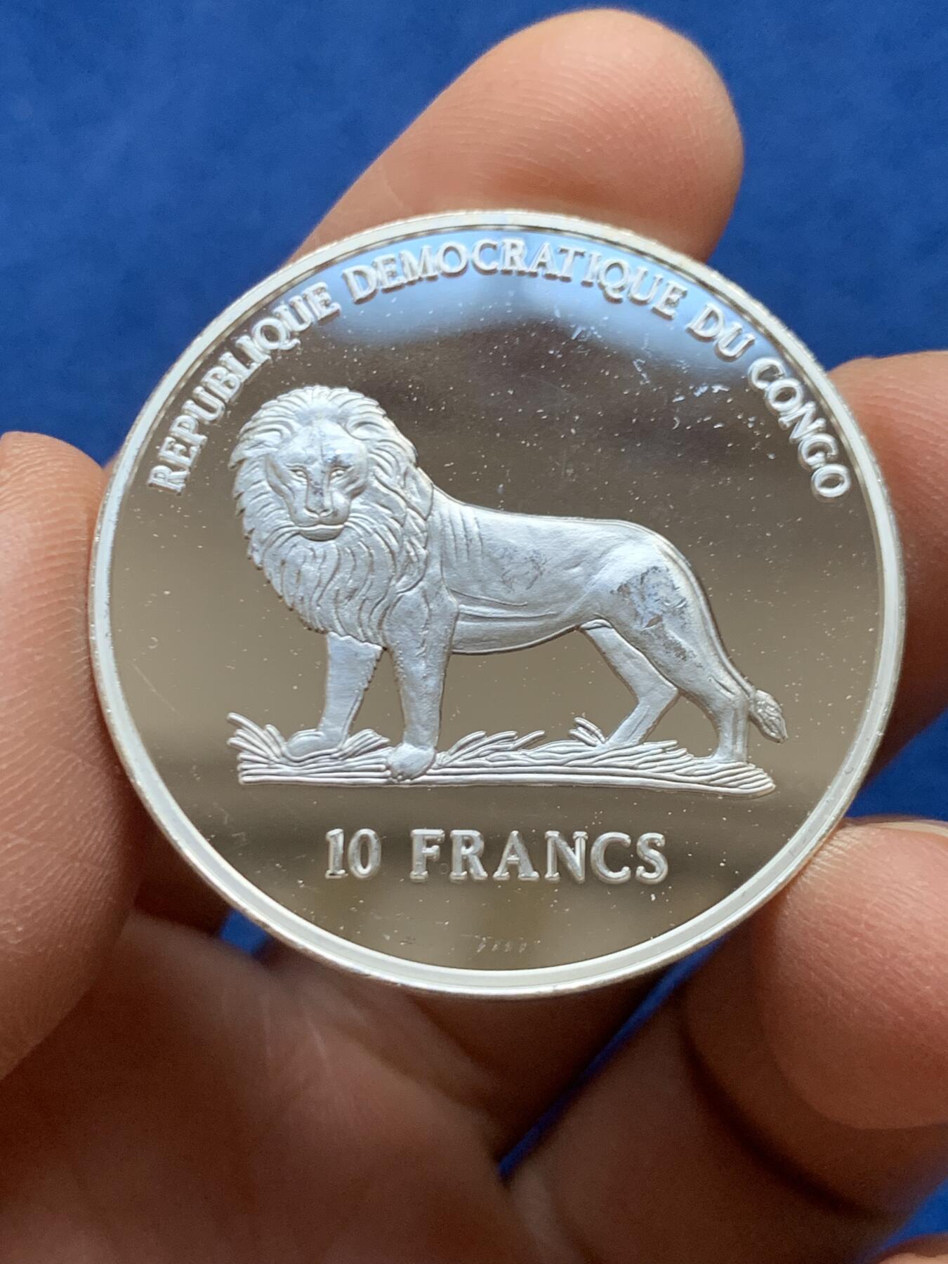 《竞宝斋》第452场 周日，周一 2场连拍 （全场包邮，欢迎送拍） 刚果1999年纪念2000年悉尼奥运会10F银币 925银 23.3克