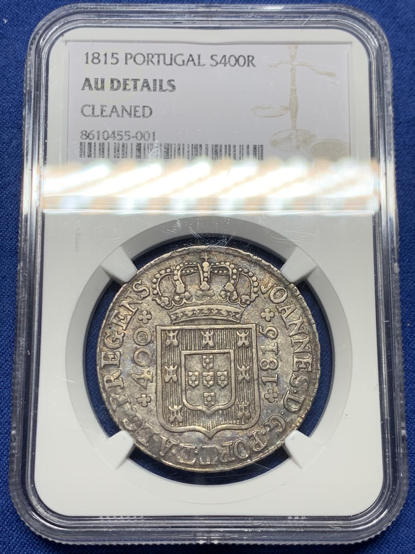 《竞宝斋》第452场 周日，周一 2场连拍 （全场包邮，欢迎送拍） NGC AUD 葡萄牙1815若昂六世400瑞斯银币，灰色老包浆，看不出清洗痕迹，应该是错杀，这款币这种深打状态很难得