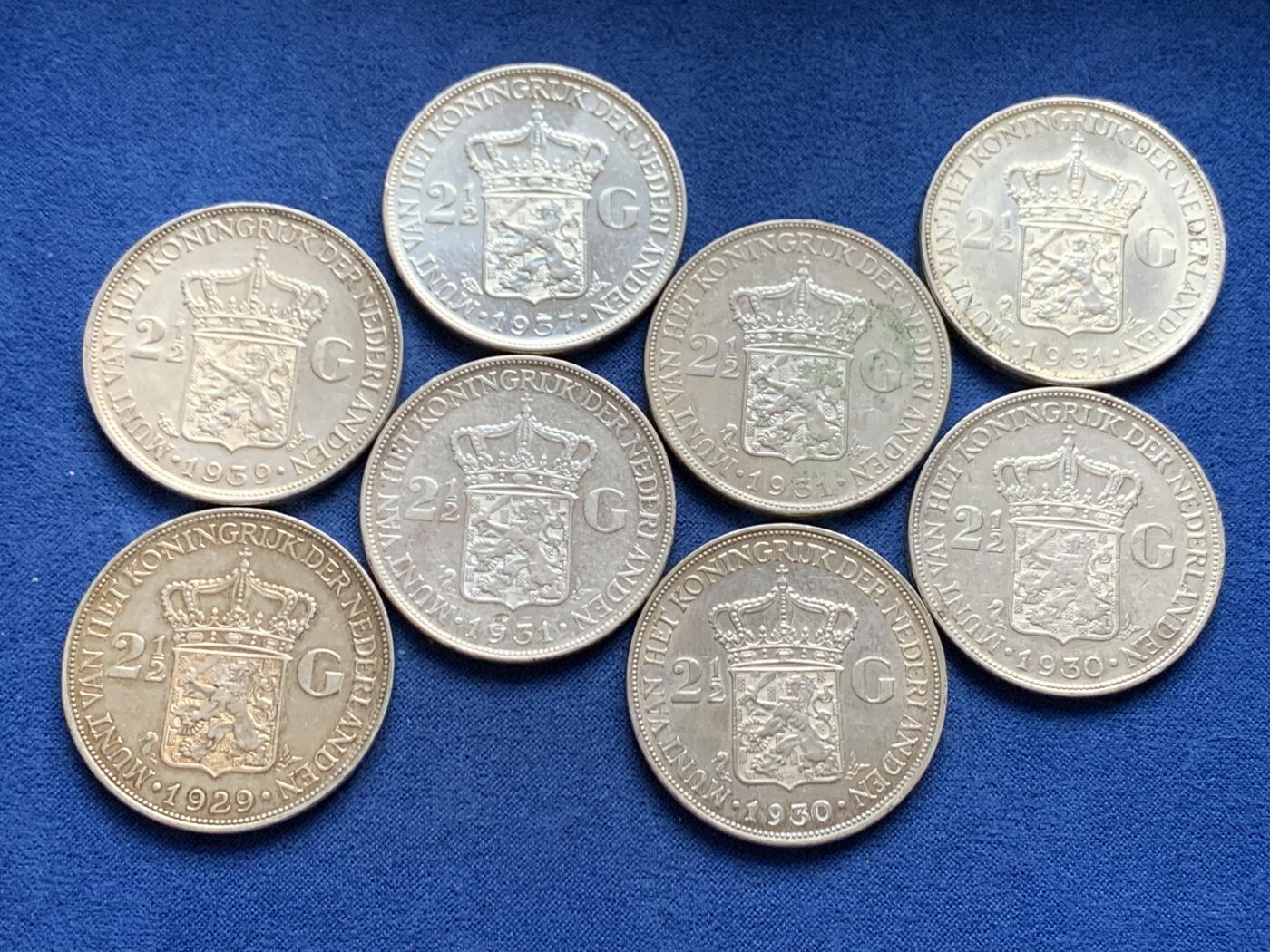 《竞宝斋》第452场 周日，周一 2场连拍 （全场包邮，欢迎送拍） 八枚一组 荷兰1929年-1939年威廉明娜2.5盾大银币 720银 总重约199.4克