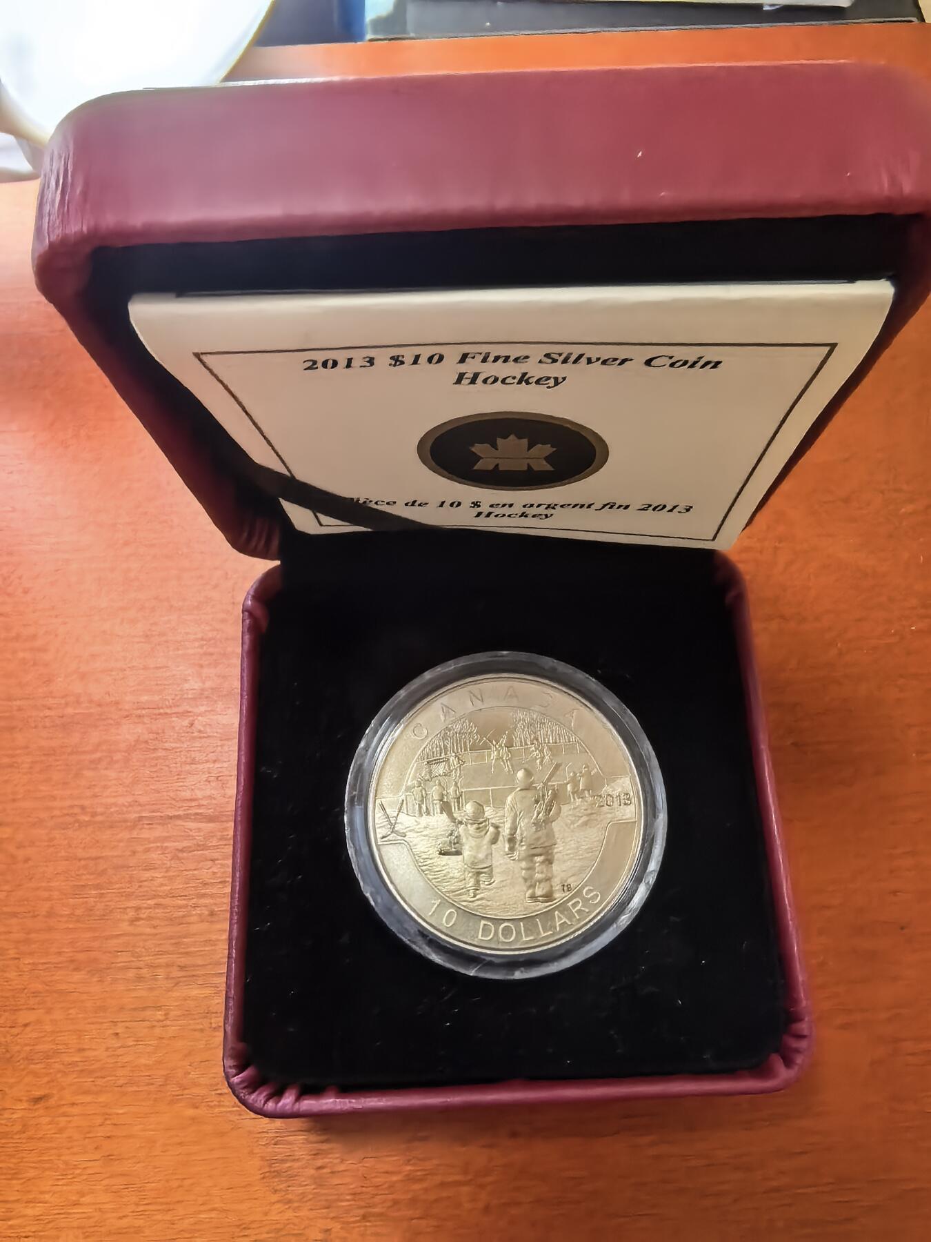 长老汇蛇年精选第八十九场拍卖 2013加拿大冰球10元镀金银币，15.87克9999银，盒证全，4万枚