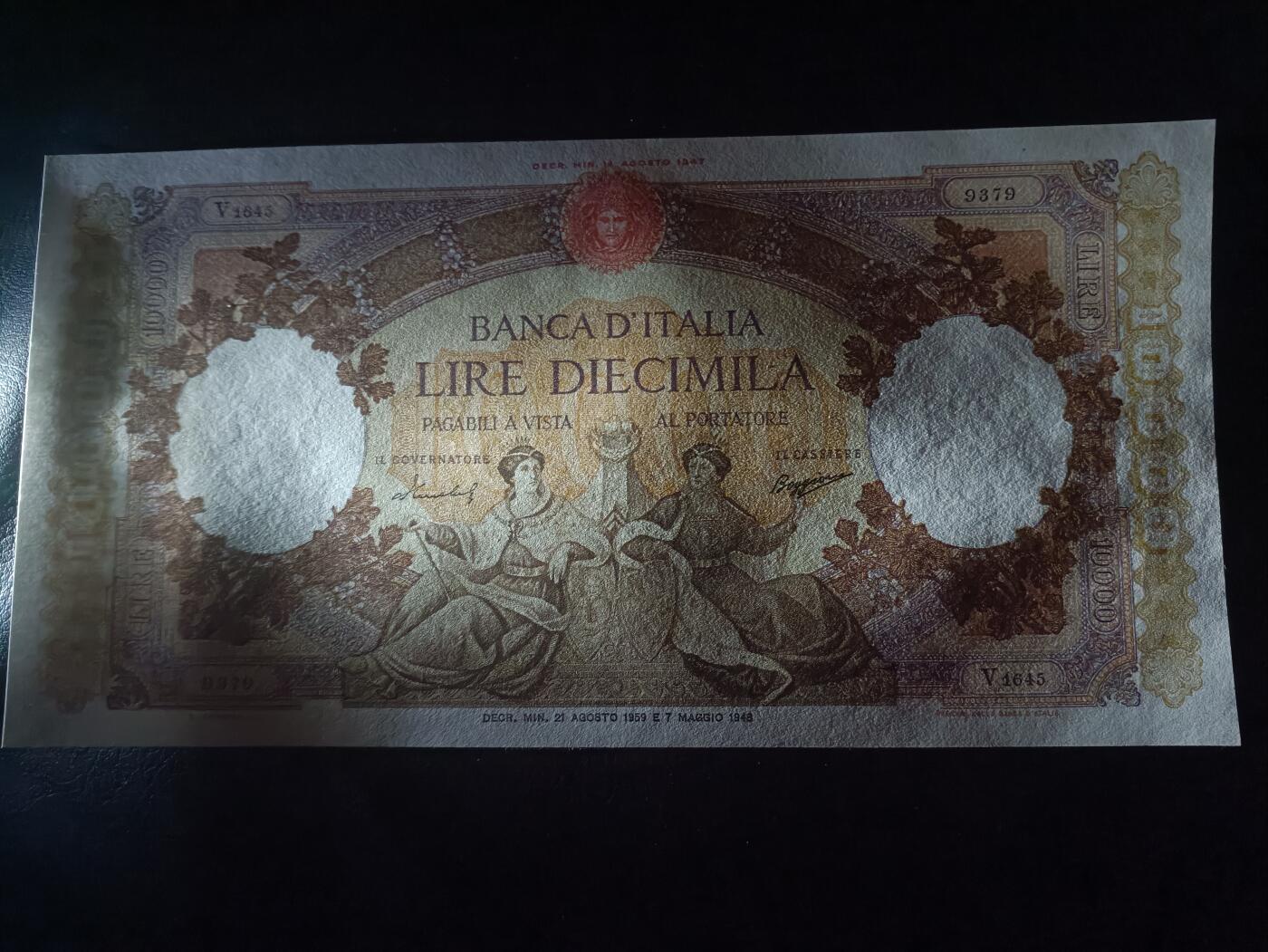 2026首期，总第211期 意大利1959年10000里拉AUNC，继承了二战纸币风格的超大票幅以及繁杂花纹，因票幅过大保存下来的好品相纸币甚是稀少，继承发展自法属纸币风格而又自成一脉，女神形象以及商人形象，此纸币在当年也不失为一笔巨款