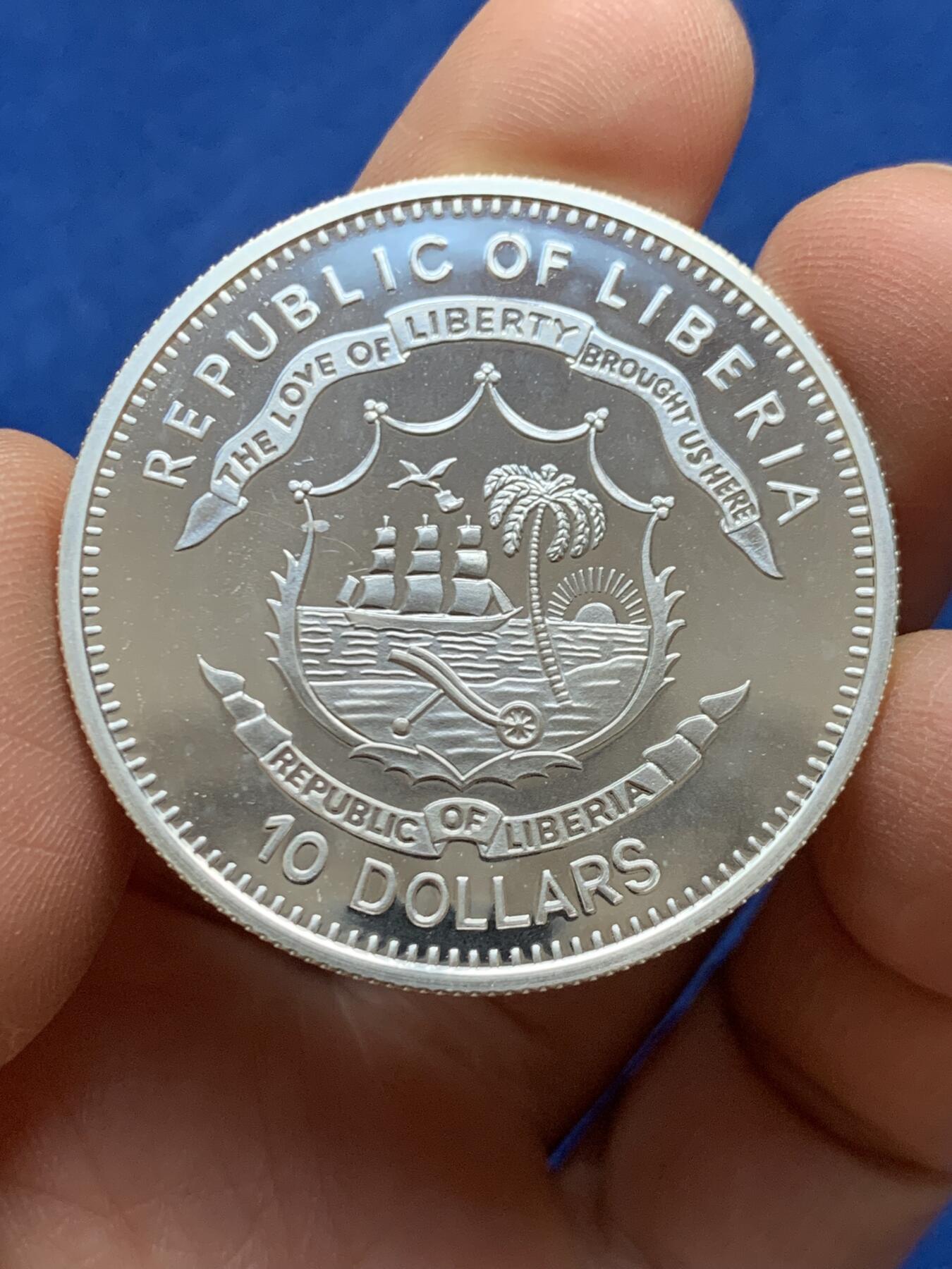 《竞宝斋》第452场 周日，周一 2场连拍 （全场包邮，欢迎送拍） 利比里亚2000年第二十七届奥运会帆船比赛10D银币 999银 31.1克