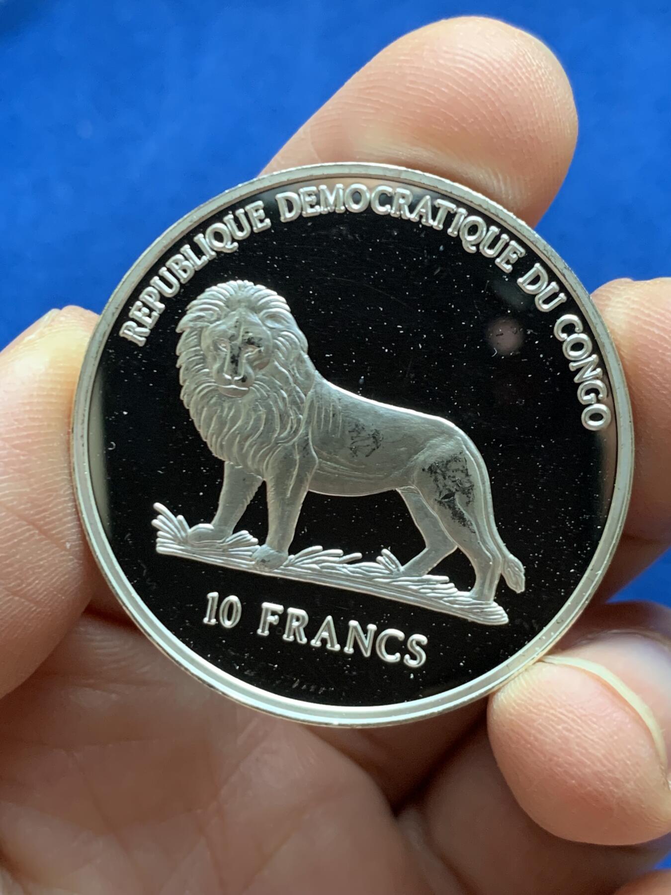 《竞宝斋》第452场 周日，周一 2场连拍 （全场包邮，欢迎送拍） 刚果1999年纪念2000年悉尼奥运会10F银币 925银 23.3克