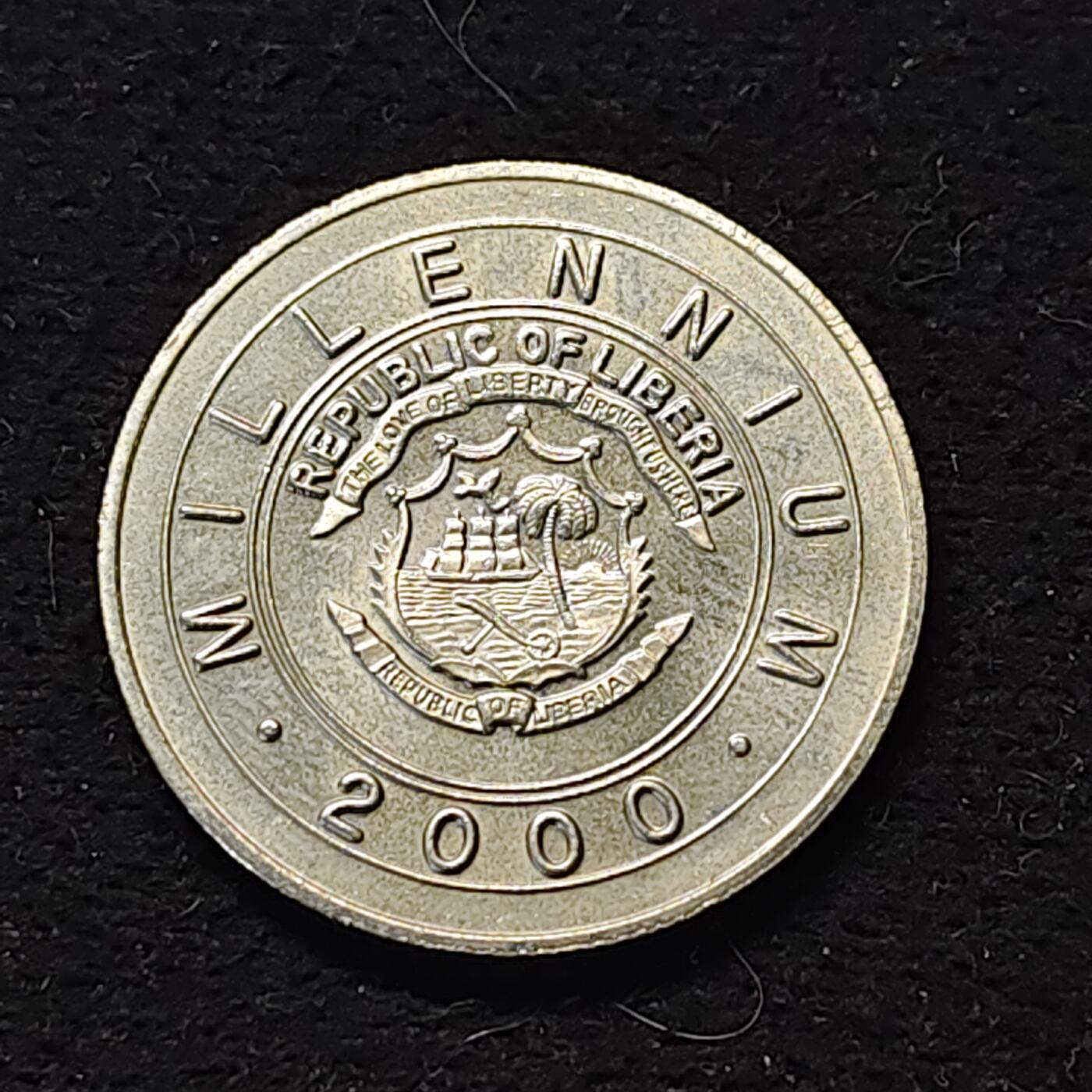 【全场包邮】纯粹捡漏拍490场（免费代拍第27场） 利比里亚2000年1元千禧年纪念币