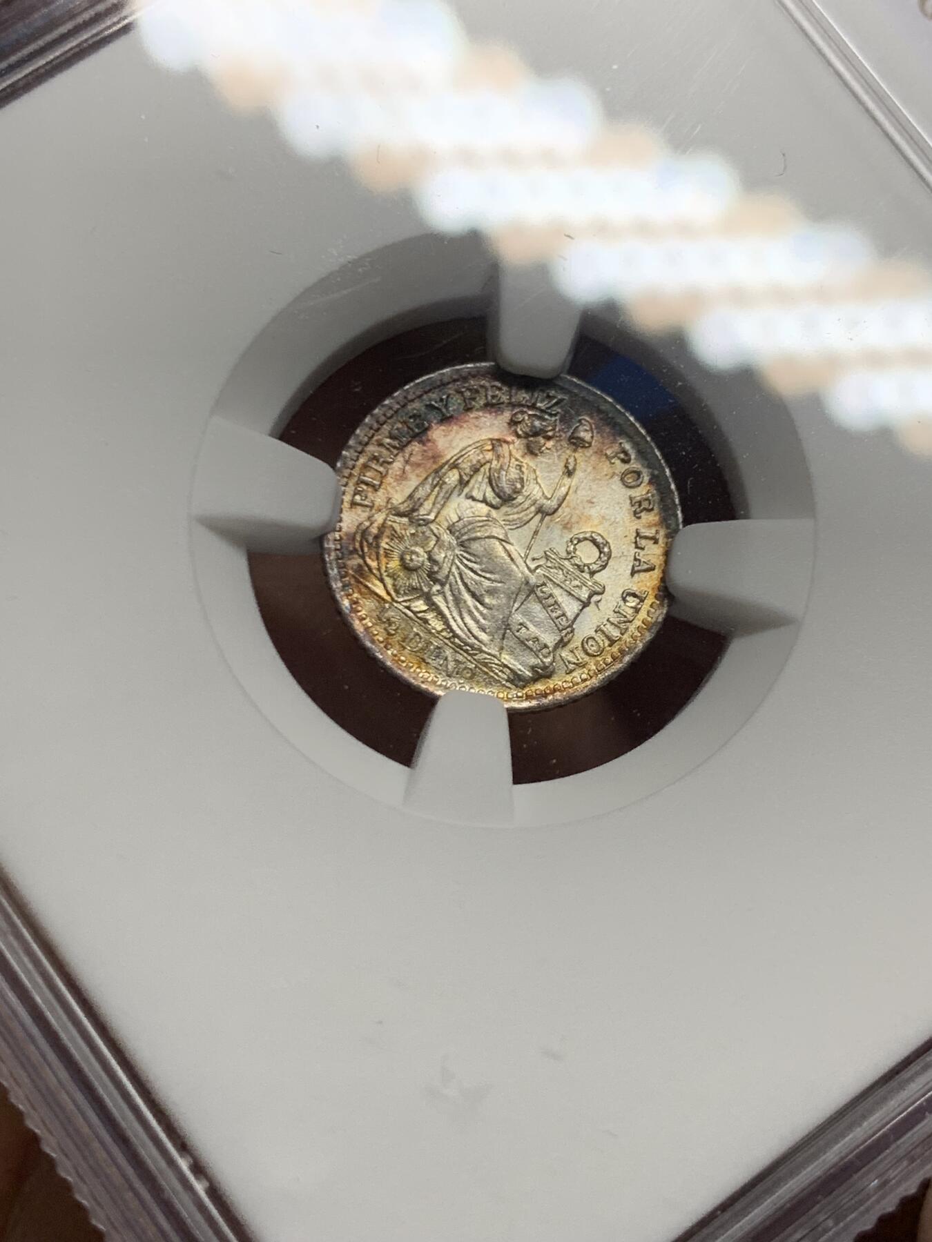 《竞宝斋》第452场 周日，周一 2场连拍 （全场包邮，欢迎送拍） NGC MS64 秘鲁1916年1/2蒂罗娜银币，带一抹极其亮眼的月牙彩，底板有镜面感，不可多得的好状态