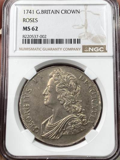 万国钱币拍卖第058期（万国新年大拍） NGC MS62 1741英国乔治二世玫瑰克朗 英国克朗系列中的大名誉品种 早期青年版头像 来自十八世纪中期的巅峰工艺 深峻的打制让你不会错过任何一个高点细节 玫瑰与纹章的设计在双面香槟金彩的加持下尽显雍容 不同错过的顶级收藏品质