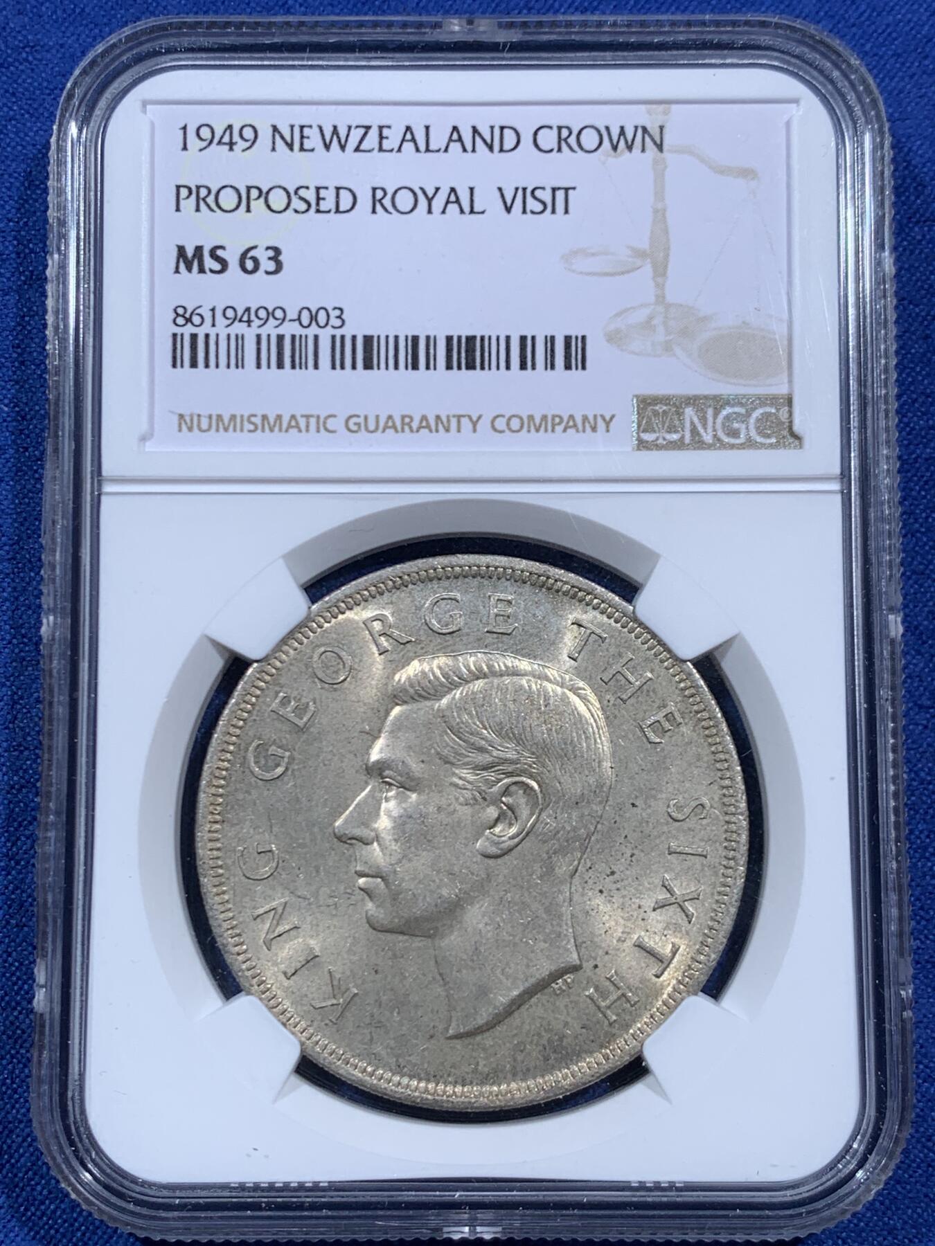 《竞宝斋》第452场 周日，周一 2场连拍 （全场包邮，欢迎送拍） NGC MS63 新西兰1949年乔治六世克朗大银币，淡黄油包浆，光度很好。