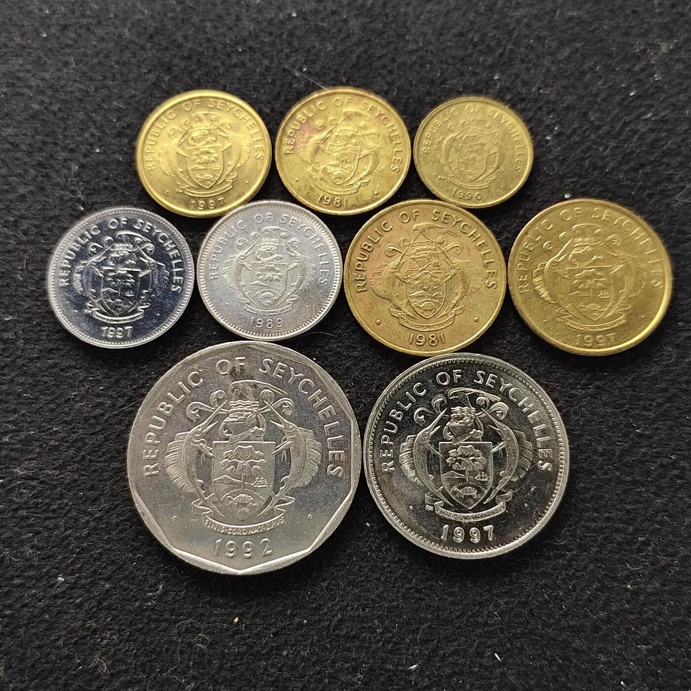 【全场包邮】纯粹捡漏拍490场（免费代拍第27场） 塞舌尔各年份9枚套币-含2枚加字FAO纪念币+25分不同版本2枚