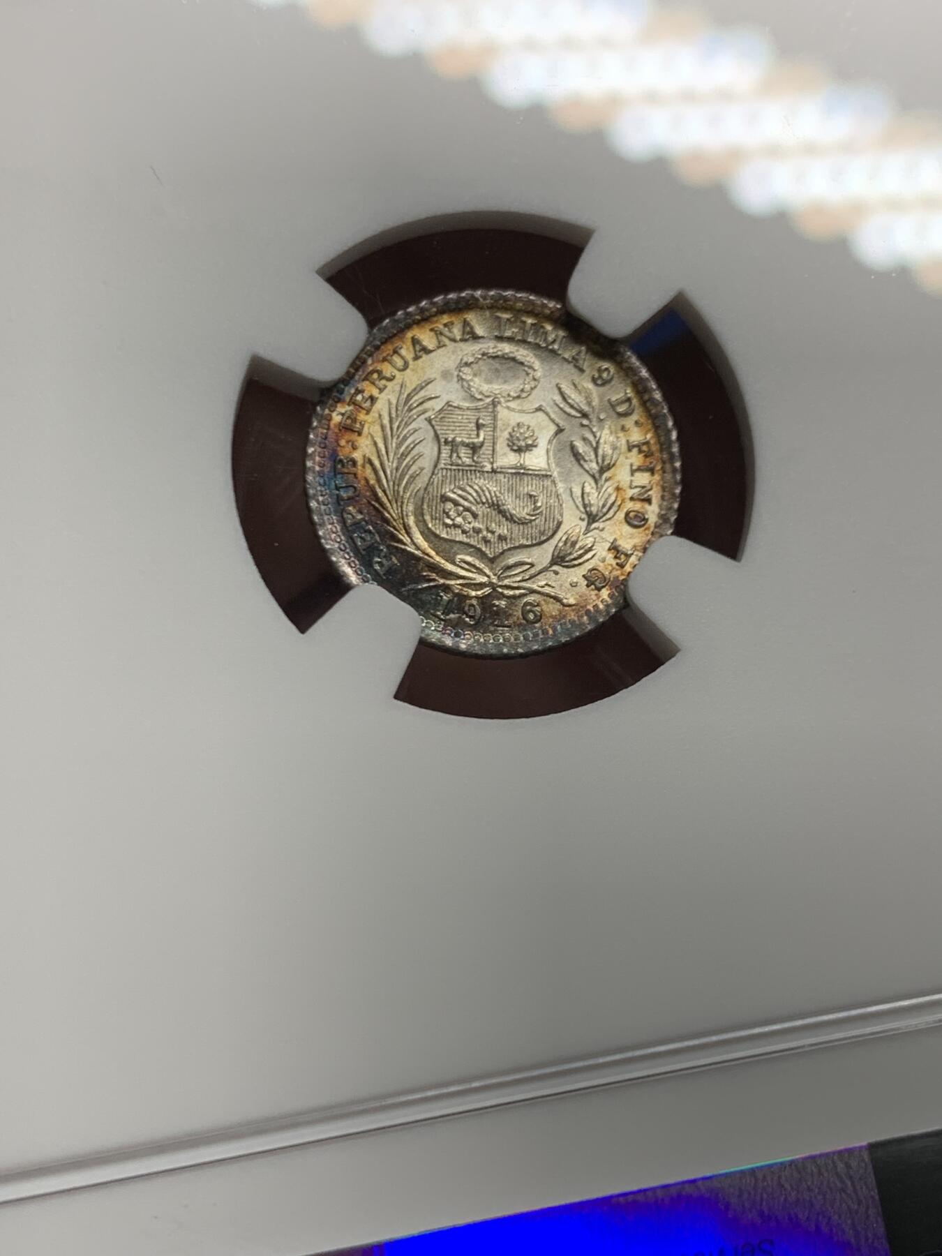 《竞宝斋》第452场 周日，周一 2场连拍 （全场包邮，欢迎送拍） NGC MS64 秘鲁1916年1/2蒂罗娜银币，带一抹极其亮眼的月牙彩，底板有镜面感，不可多得的好状态