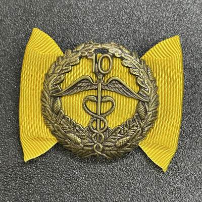 西秦中古拍卖第七十一期 - 芬兰商会10年服务荣誉证章 背面有厂标