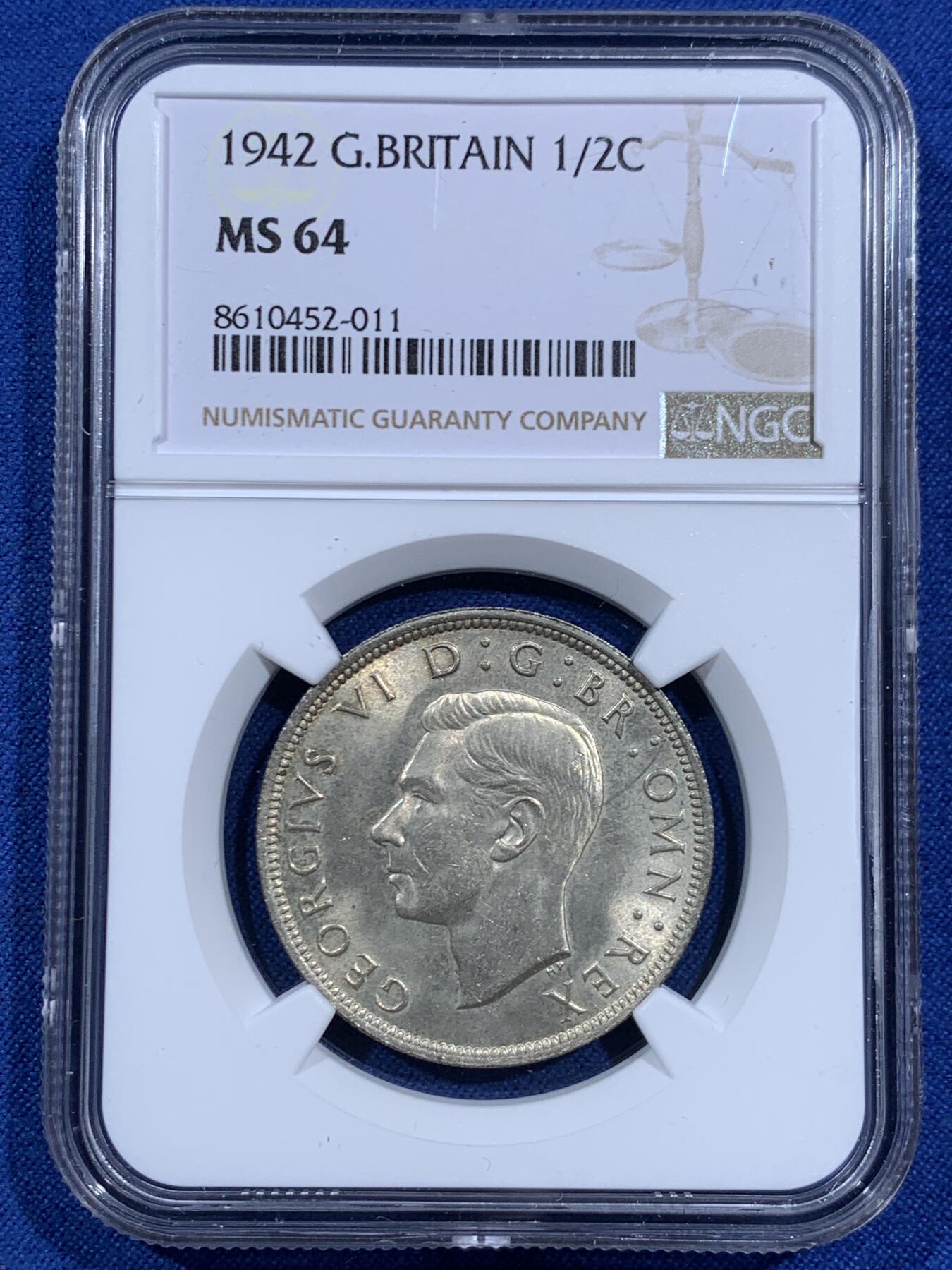 《竞宝斋》第452场 周日，周一 2场连拍 （全场包邮，欢迎送拍） NGC MS64 英国1942年年半克朗银币，BU卷拆好品，背面淡金包浆挺美，乔六的币上64还是有一定难度的