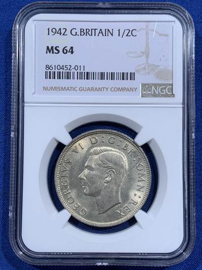 《竞宝斋》第452场 周日，周一 2场连拍 （全场包邮，欢迎送拍） - NGC MS64 英国1942年年半克朗银币，BU卷拆好品，背面淡金包浆挺美，乔六的币上64还是有一定难度的