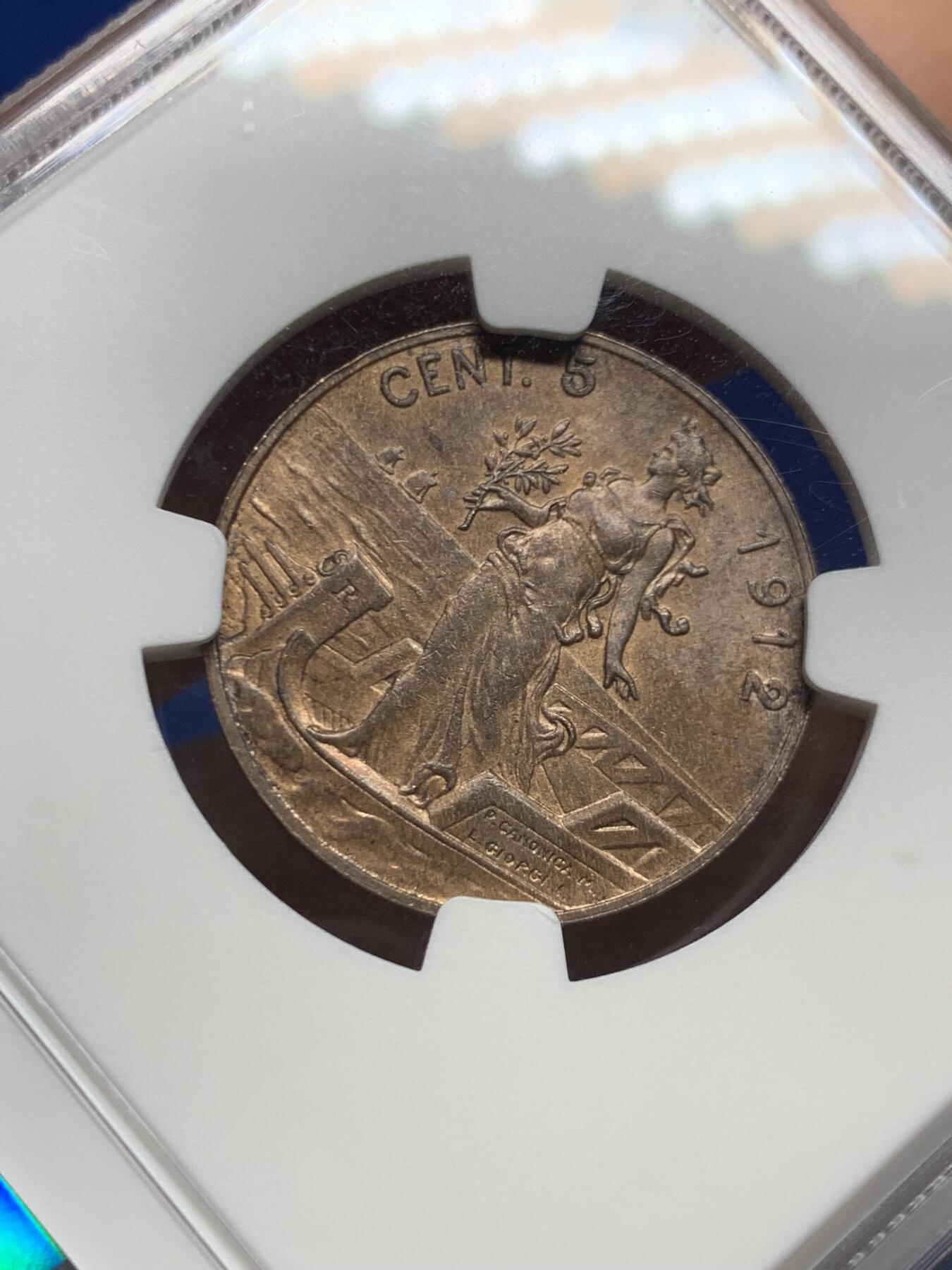 《竞宝斋》第452场 周日，周一 2场连拍 （全场包邮，欢迎送拍） NGC MS62BN 意大利1912年5分拿花铜币，少见年份（特年）书价高，在200美元左右。