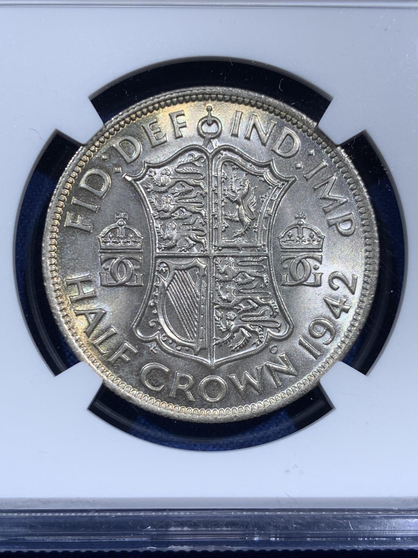 《竞宝斋》第452场 周日，周一 2场连拍 （全场包邮，欢迎送拍） NGC MS64 英国1942年年半克朗银币，BU卷拆好品，背面淡金包浆挺美，乔六的币上64还是有一定难度的