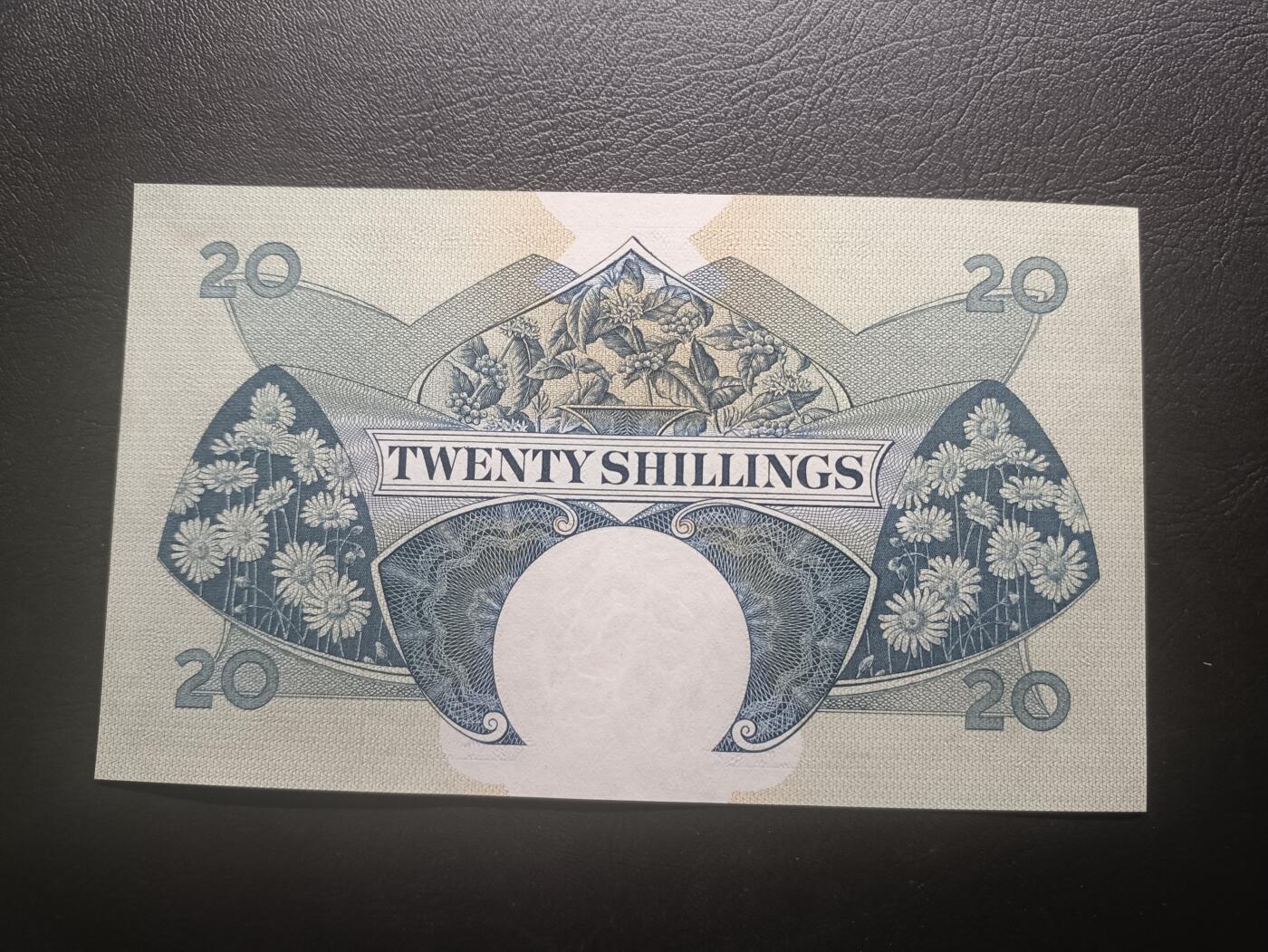 2026首期，总第211期 英属东非1961年20先令UNC背面左上极轻微黄，青年大皇冠女王，稀有的中高面值