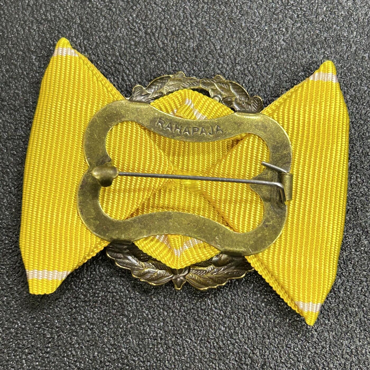 西秦中古拍卖第七十一期 芬兰商会15年服务荣誉证章 背面有厂标