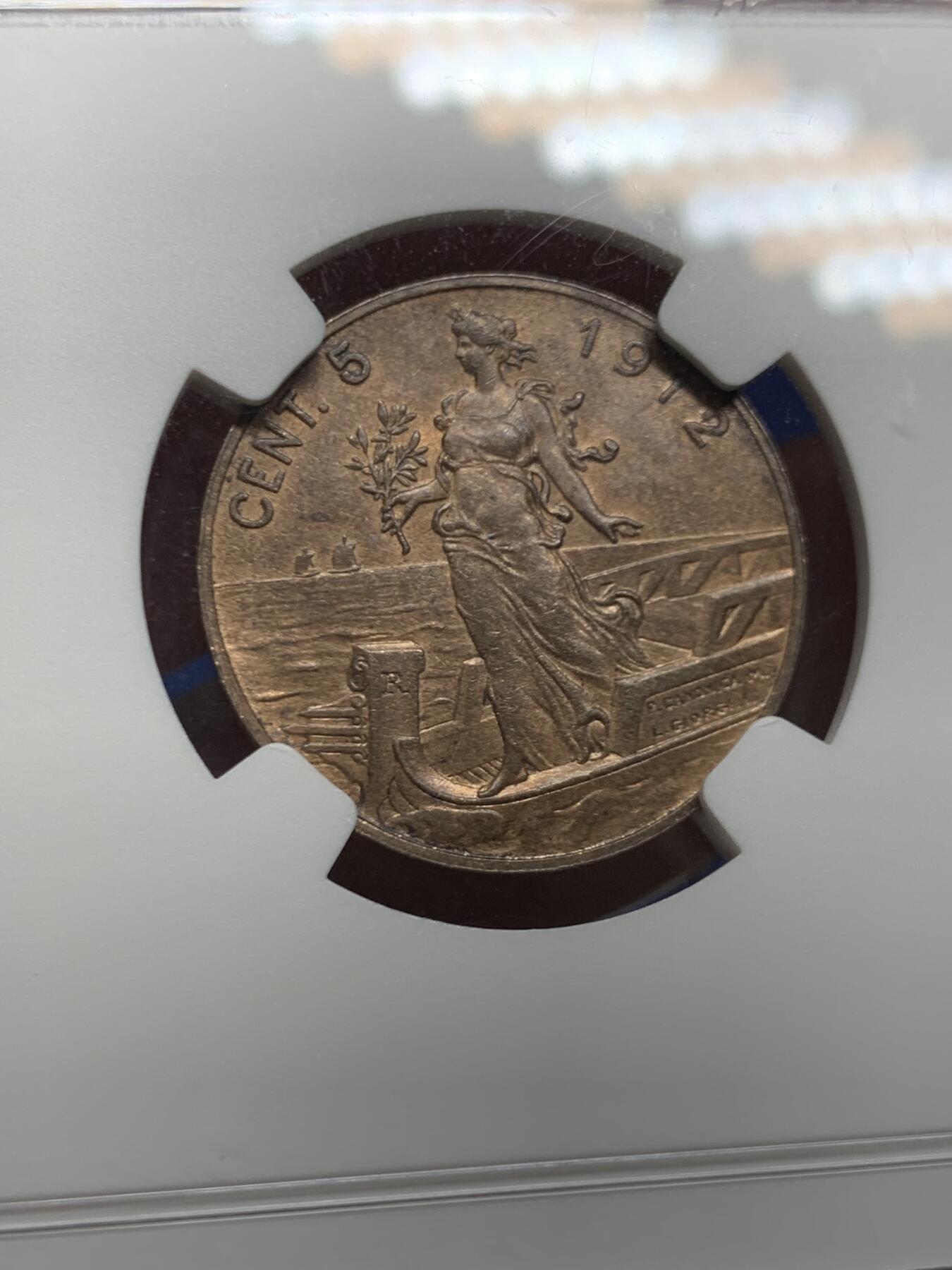 《竞宝斋》第452场 周日，周一 2场连拍 （全场包邮，欢迎送拍） NGC MS62BN 意大利1912年5分拿花铜币，少见年份（特年）书价高，在200美元左右。