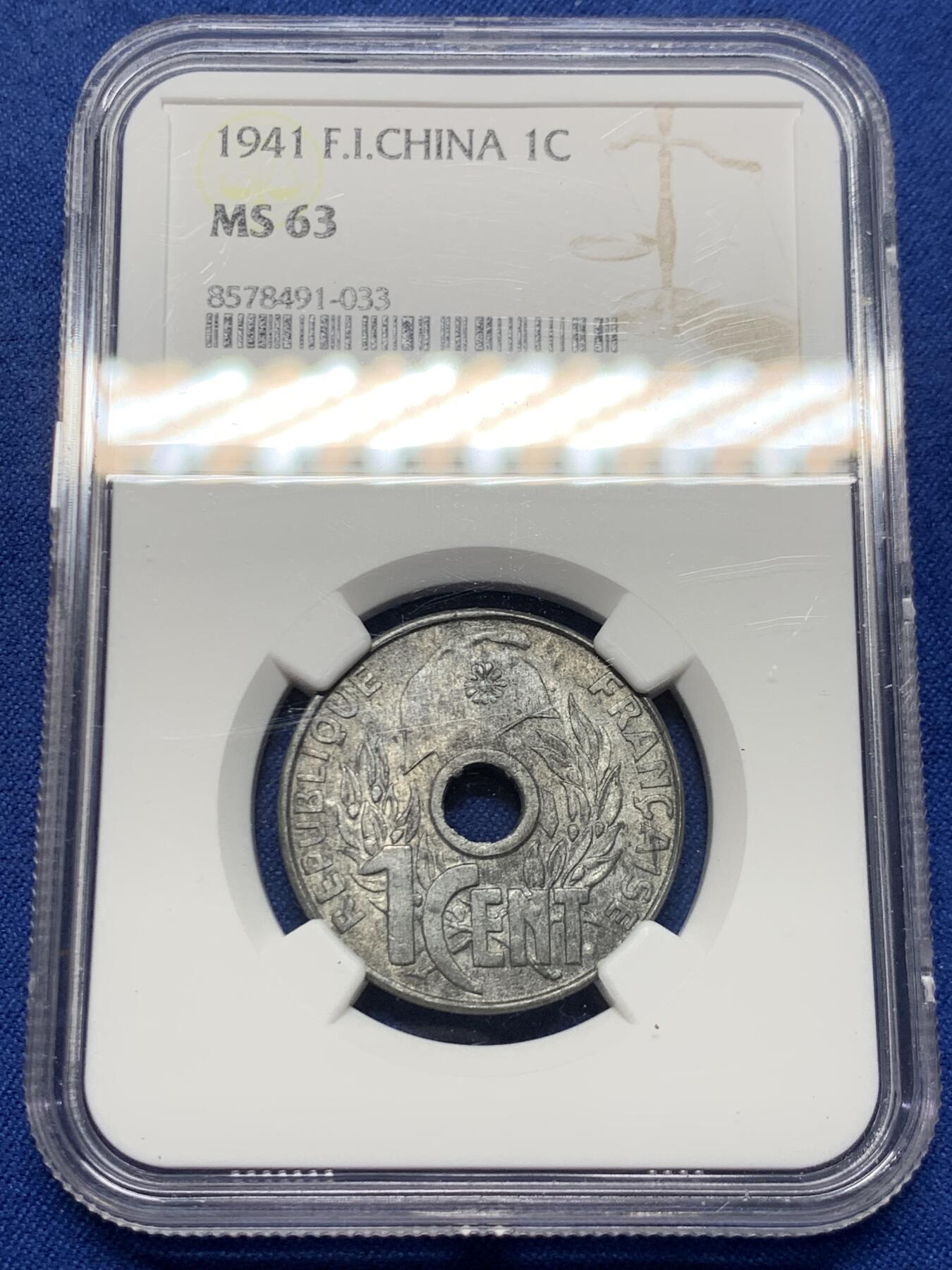 《竞宝斋》第452场 周日，周一 2场连拍 （全场包邮，欢迎送拍） NGC MS63 法属印支1941花帽1分锌币 保存非常难得