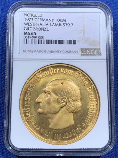 《竞宝斋》第452场 周日，周一 2场连拍 （全场包邮，欢迎送拍） - NGC MS65 德国1923年德紧威斯特法伦马币 10000马克镀金铜币，镀层相对完整，漂亮，金光闪闪。
