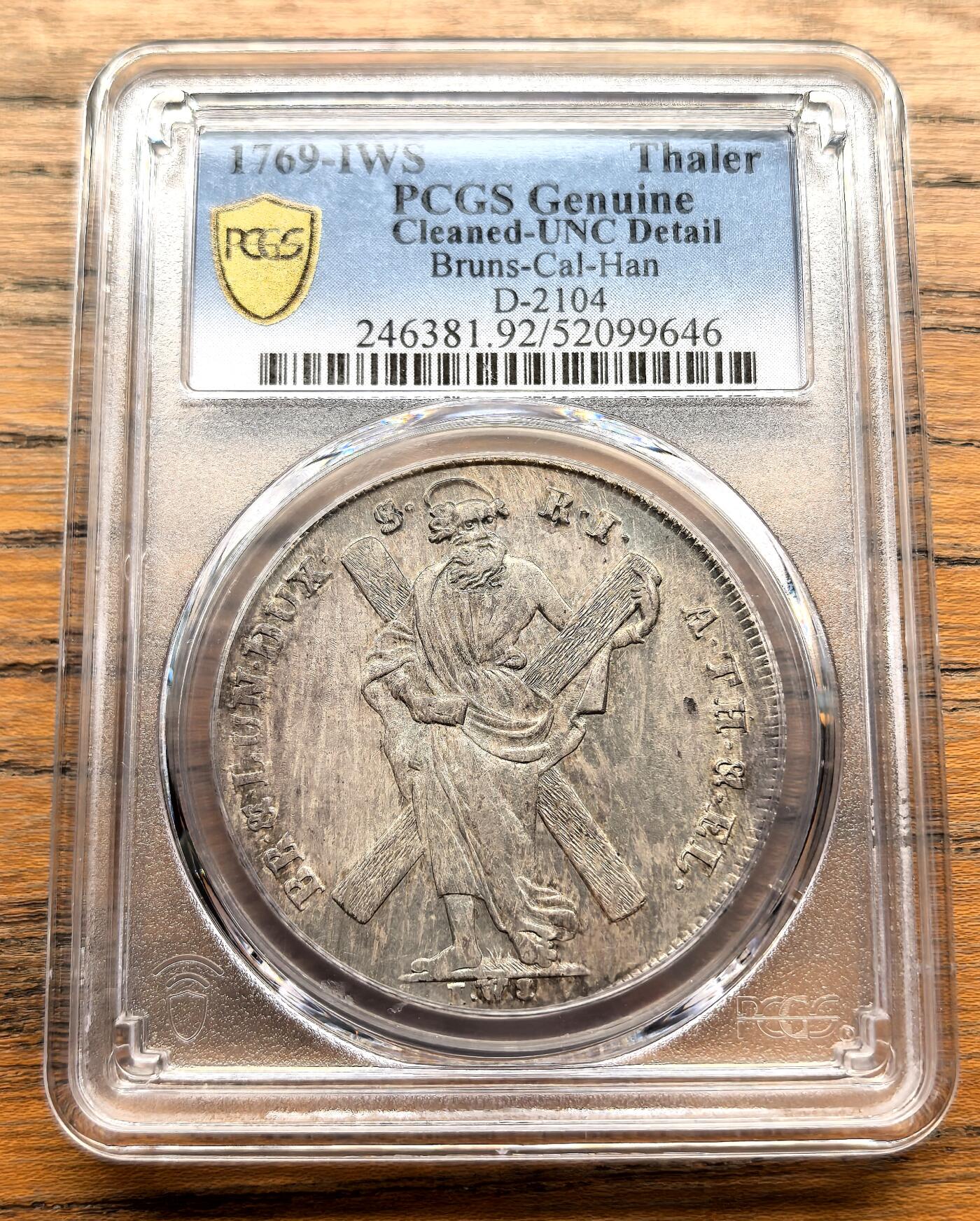 凡希社世界钱币微拍第三百十六期 1769德国不伦瑞克-卡伦贝格-汉诺威圣安德鲁与十字架泰勒大银PCGS-UNCD，欧陆灰彩，实物状态一流，正面略有色差。