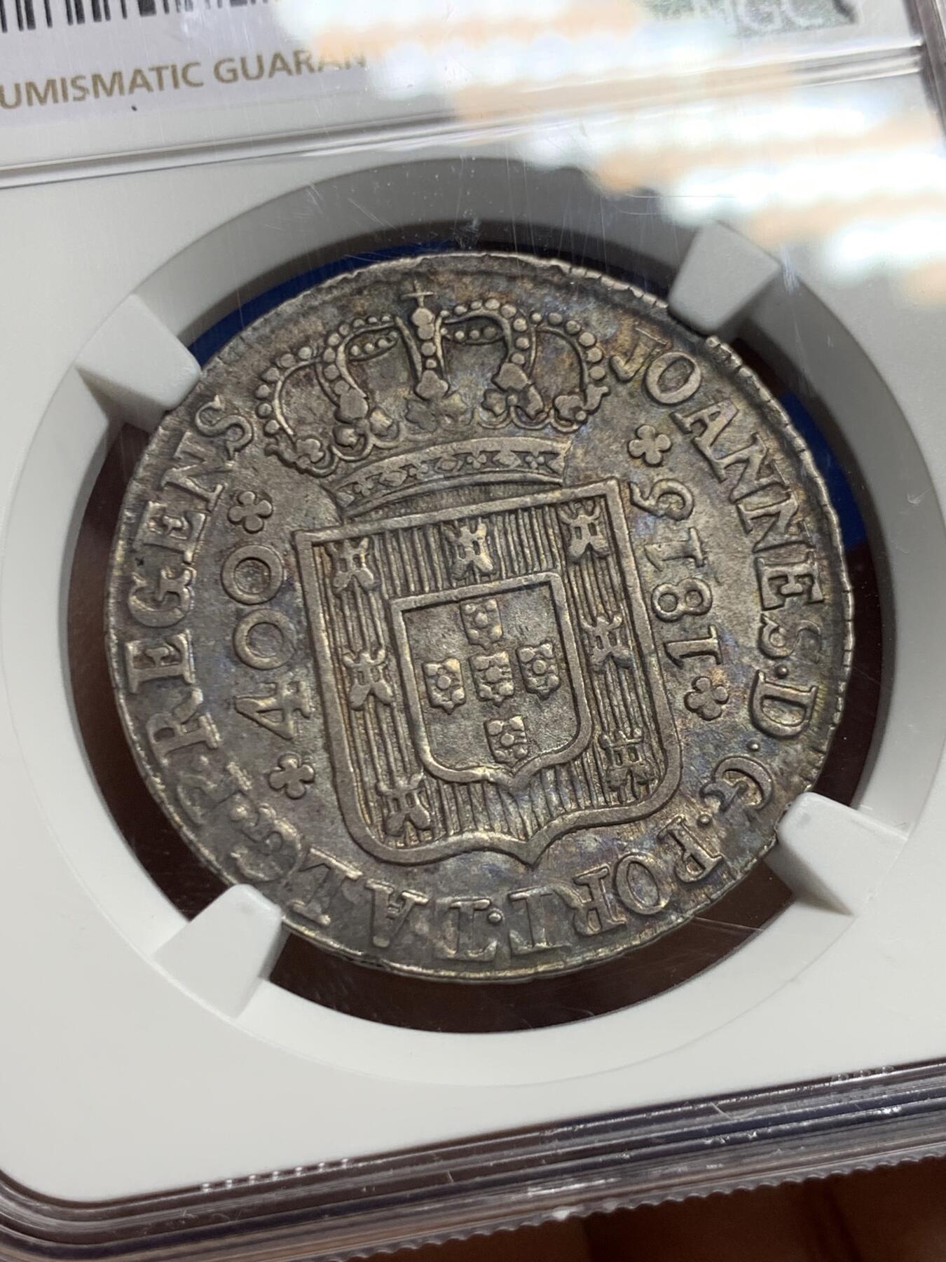 《竞宝斋》第452场 周日，周一 2场连拍 （全场包邮，欢迎送拍） NGC AUD 葡萄牙1815若昂六世400瑞斯银币，灰色老包浆，看不出清洗痕迹，应该是错杀，这款币这种深打状态很难得