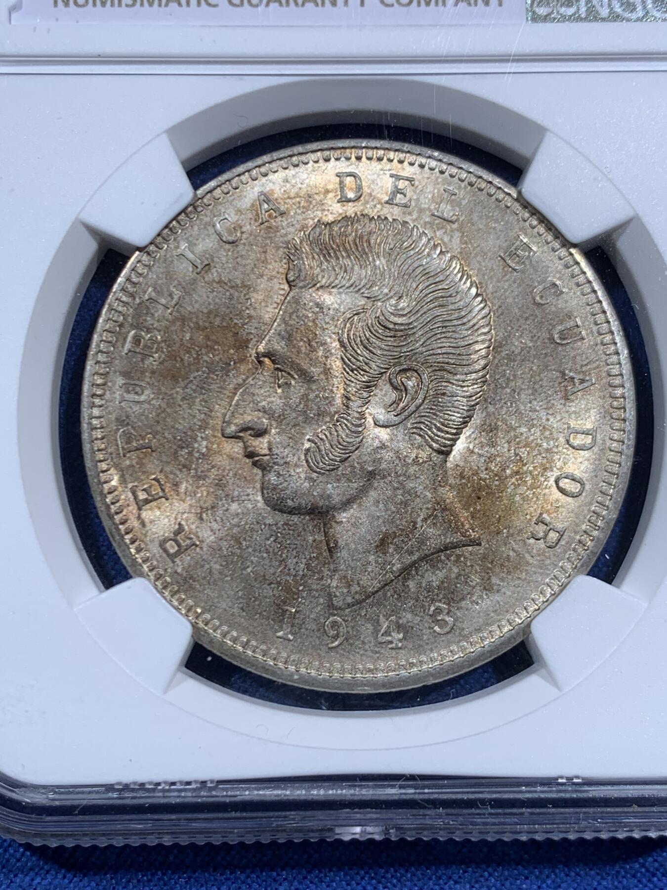 《竞宝斋》第452场 周日，周一 2场连拍 （全场包邮，欢迎送拍） NGC MS64 厄瓜多尔1943年5苏克雷大银币，共发行2年，较少的年份，转光强烈，极美包浆。