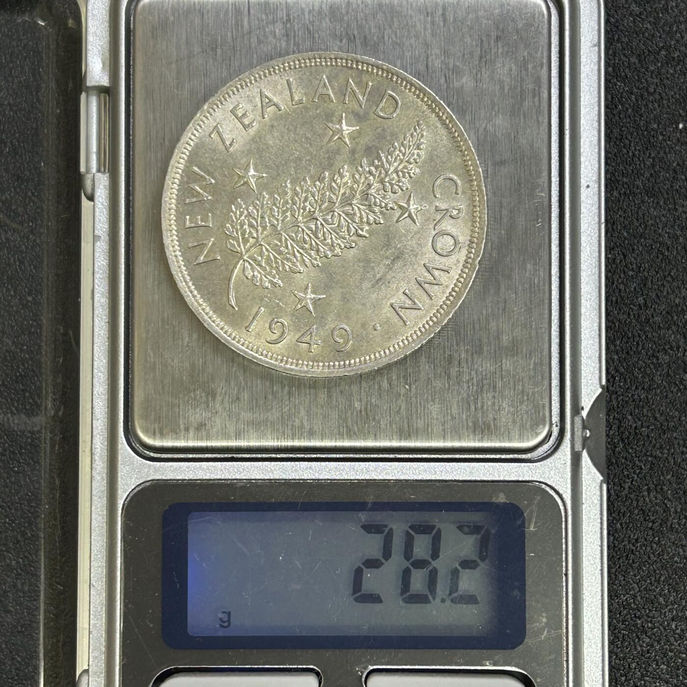 西秦中古拍卖第七十一期 新西兰1949年1克朗大银币 乔治六世 重28.2克