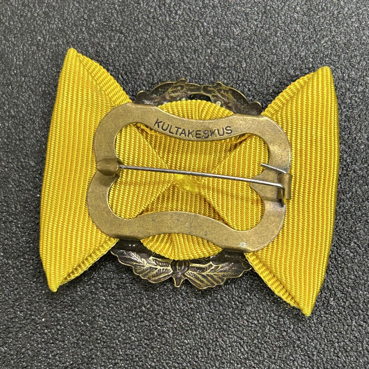 西秦中古拍卖第七十一期 芬兰商会10年服务荣誉证章 背面有厂标