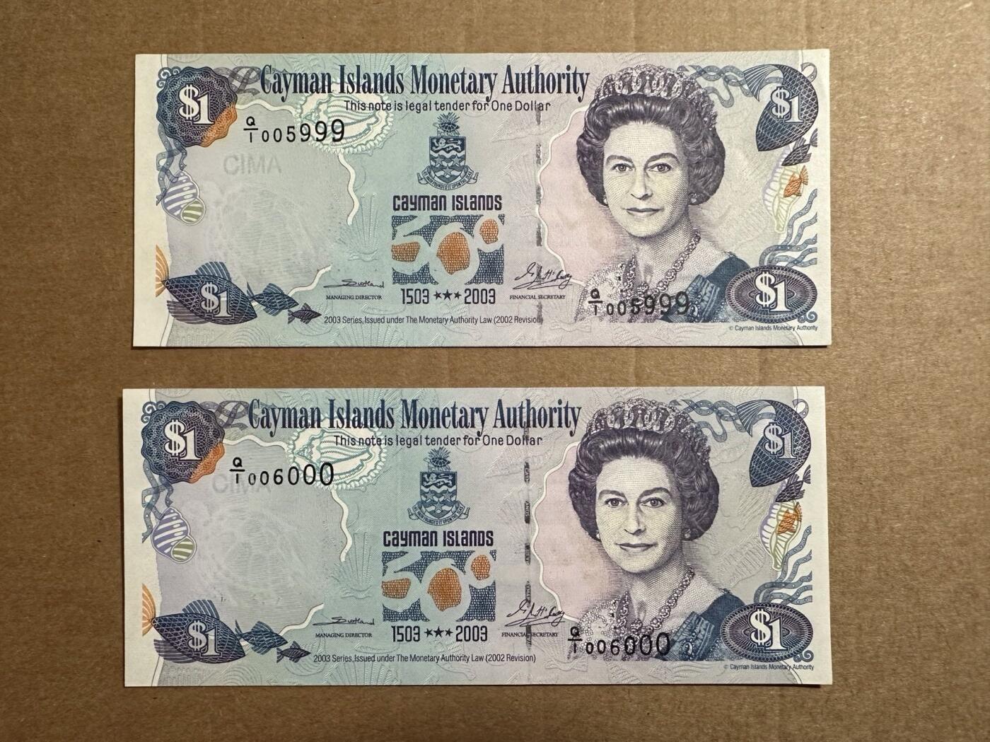 🐍甜小邱世界纸币收藏🐍第138期精品场💐 Q/1首发冠 999+000豹子号两张 全新UNC 开曼群岛 1元 “开曼群岛500周年纪念” 2003