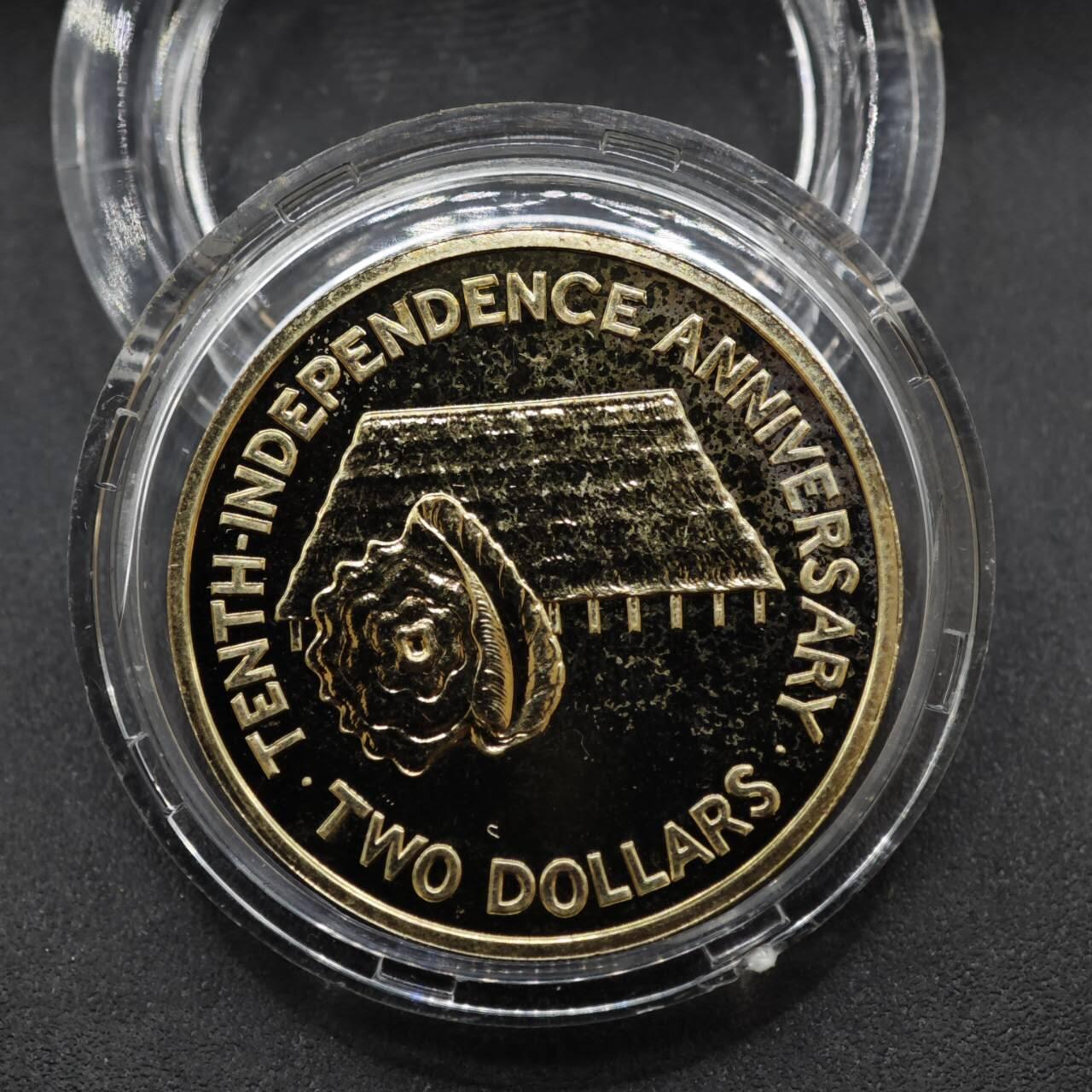 【淘币小摊】实时拍第八百三十七拍   散币银币场   满百包邮可预留二周 每周一统一发货   基里巴斯1989年2元茅草屋独立10周年铜币原盒