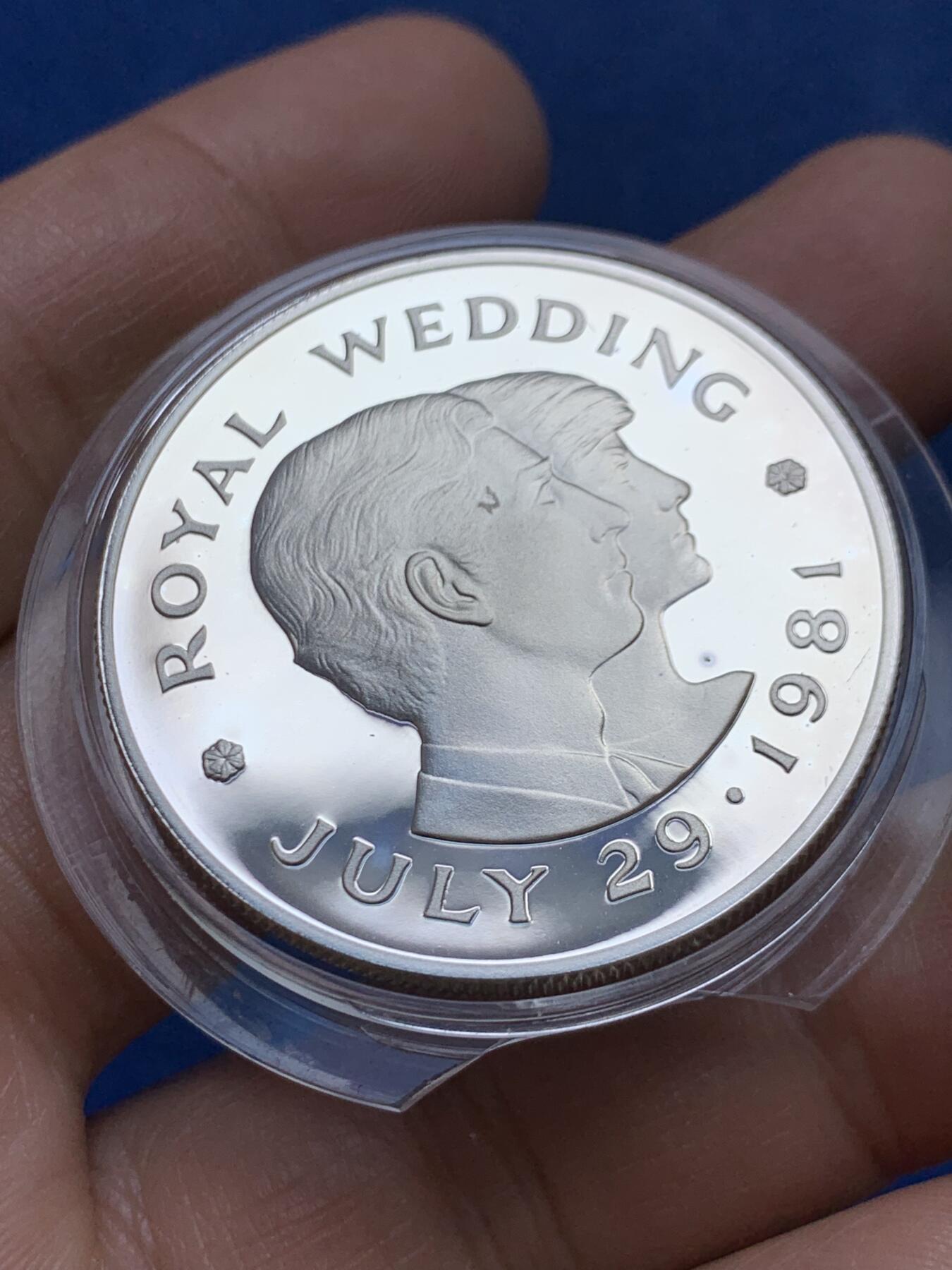 《竞宝斋》第453场 周日，周一 2场连拍 （全场包邮，欢迎送拍） 英属泽西岛1981年皇室婚礼-查尔斯王子和戴安娜·斯宾塞夫人2英镑银币 925银 27.6克