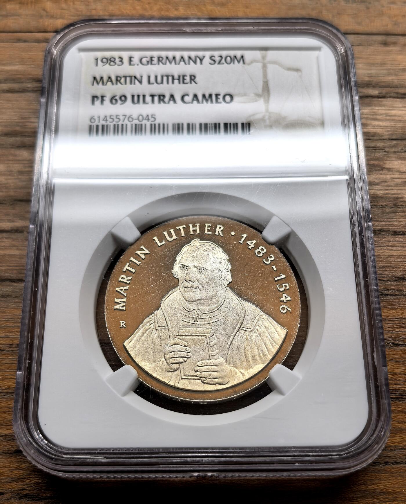 凡希社世界钱币微拍第三百十六期 1983民主德国马丁路德20马克纪念银币精铸NGC-PF69UC，铸造工艺极精湛，罕见的proof顶级品相！