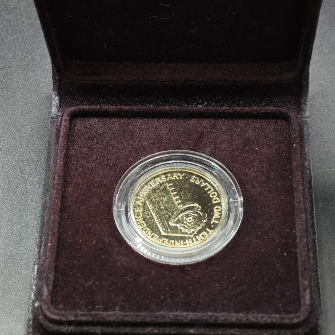 【淘币小摊】实时拍第八百三十七拍   散币银币场   满百包邮可预留二周 每周一统一发货   基里巴斯1989年2元茅草屋独立10周年铜币原盒