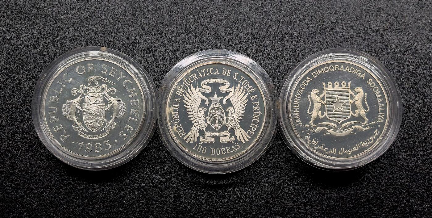 凡希社世界钱币微拍第三百十六期 塞舌尔/索马里/圣多美与普林西比渔业会议大银精铸三枚一组全品