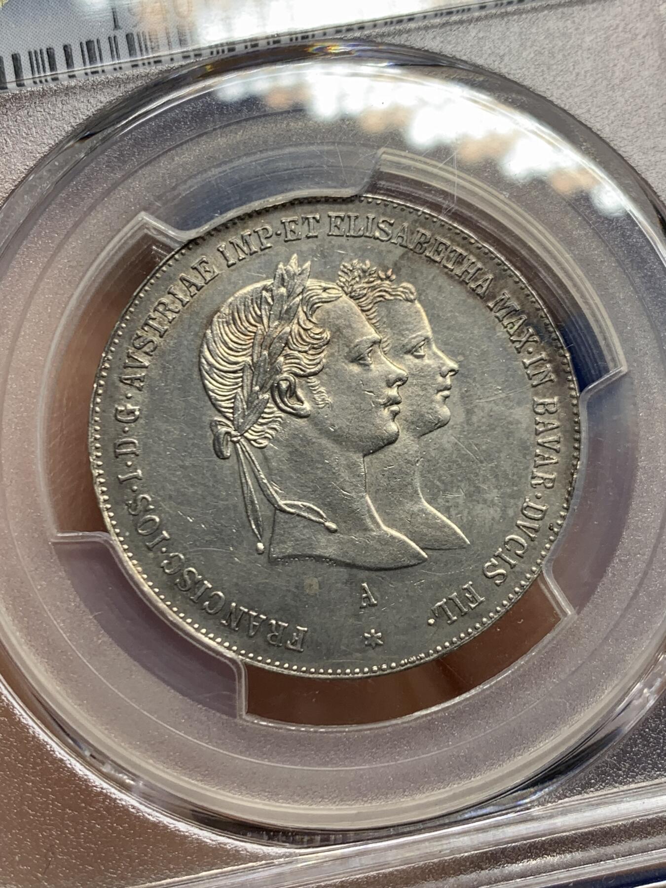 《竞宝斋》第453场 周日，周一 2场连拍 （全场包邮，欢迎送拍） PCGS UNC 奥地利1854年茜茜公主结婚纪念1盾银币，原光，人像细致，少见品种