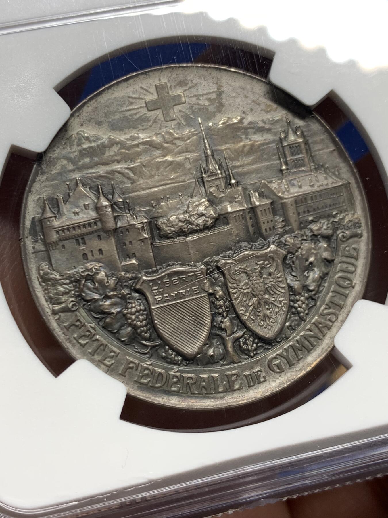 《竞宝斋》第453场 周日，周一 2场连拍 （全场包邮，欢迎送拍） NGC MS62 瑞士洛桑  1909年 城市景观铜章 超燃造型 银章极少见