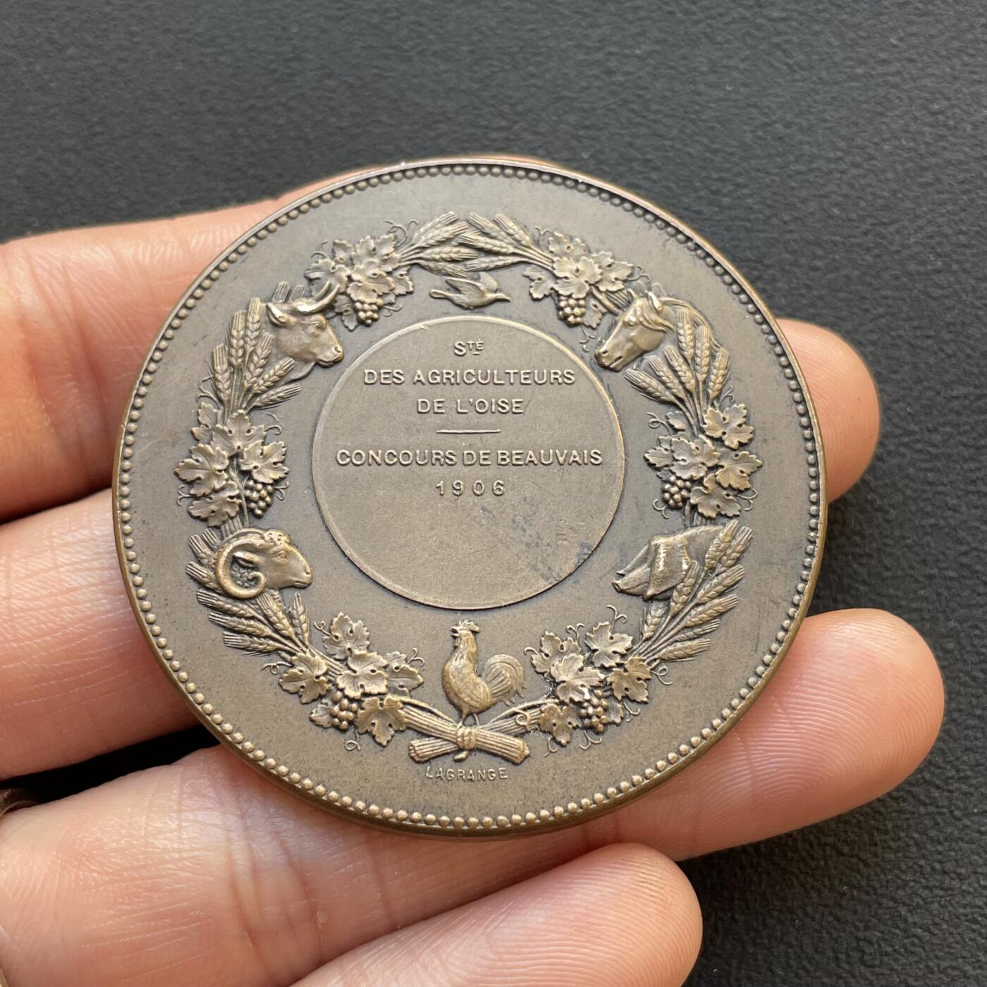 「木头集藏」章牌专场-第65场 1906年法国播种者农业铜奖章，直径：50.4 mm，65.5 g，边铭：丰饶角 BRONZE，品相不错。