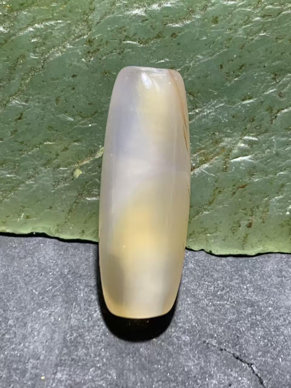 高玉化冻料巴西玛瑙通货桶珠一颗，，