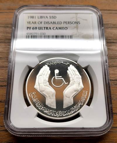 凡希社世界钱币微拍第三百十六期 - 1981利比国际亚残疾人年纪念5D大银精铸NGC-PF69UC