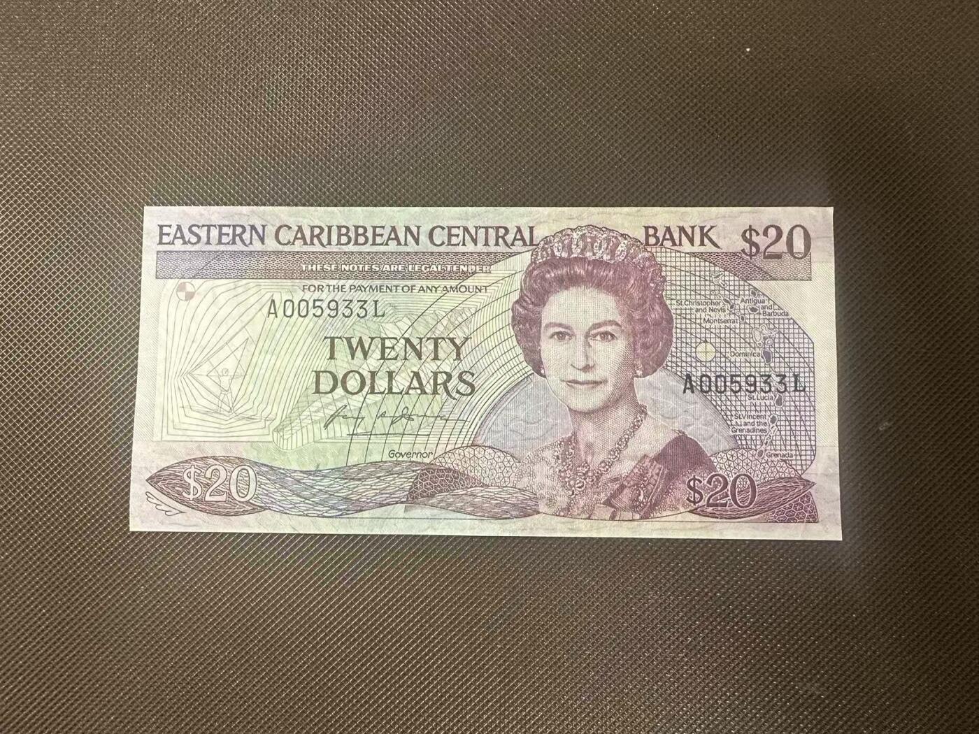 喜羊羊钱币收藏2025第11期(流通品相场)  东加勒比/圣卢西亚	P-19l 1987年20元		品相如图				A005933L			