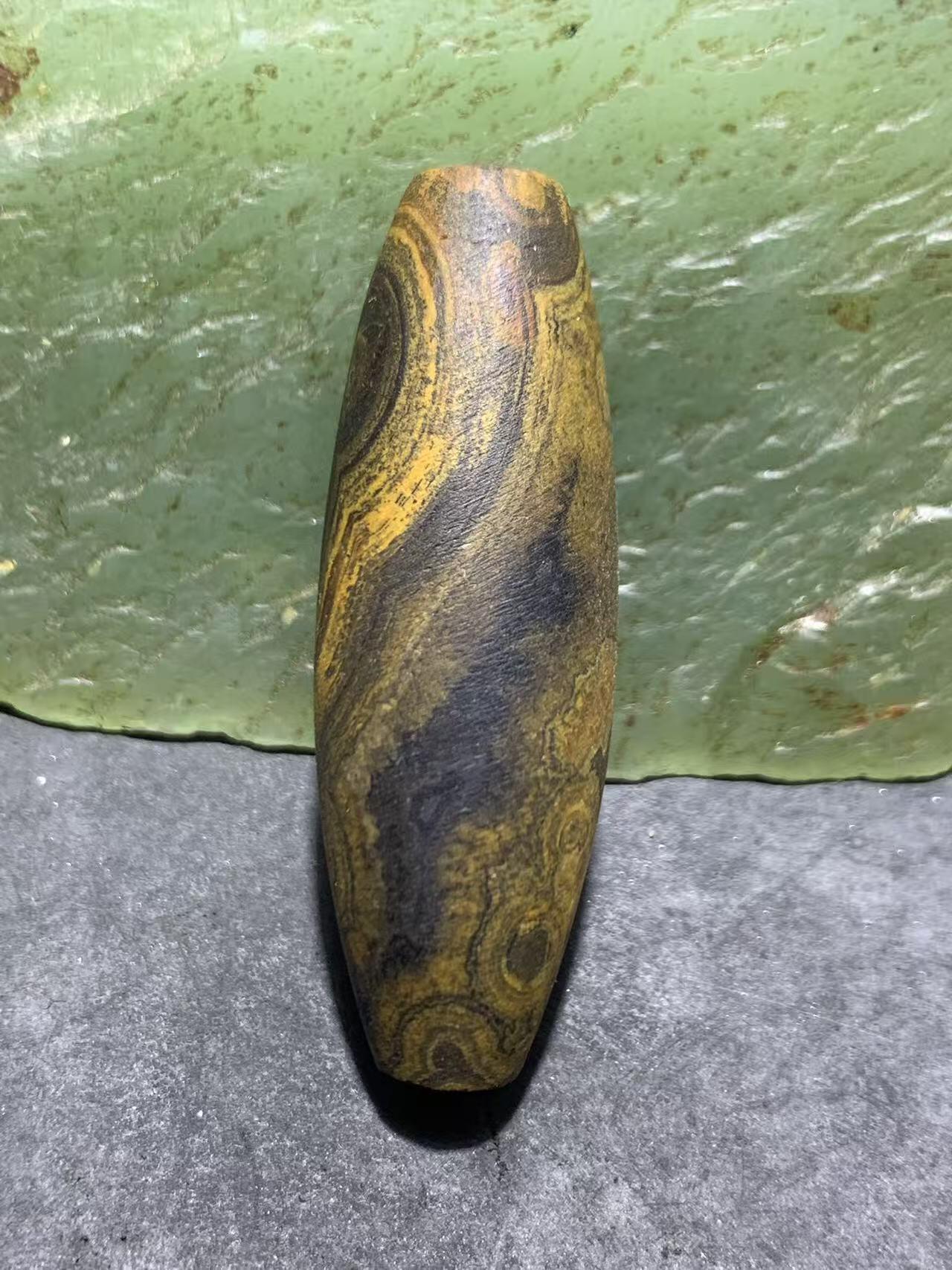 天然精美亚光九眼页岩8字天眼纹天珠一个