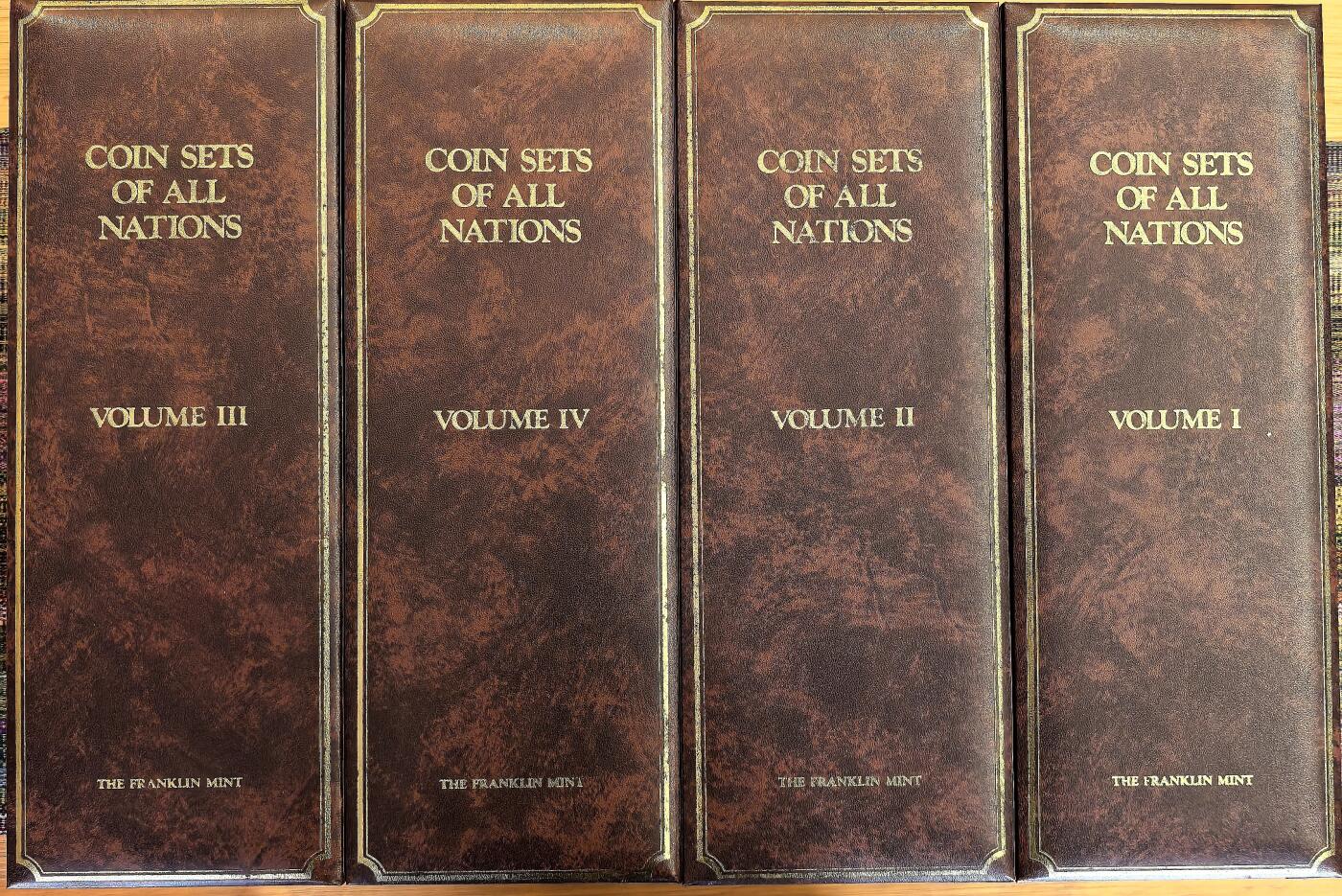 凡希社世界钱币微拍第三百十六期 富兰克林厂各国流通套币豪华装四册，共137个国家，品相卓越，每套附单独证书