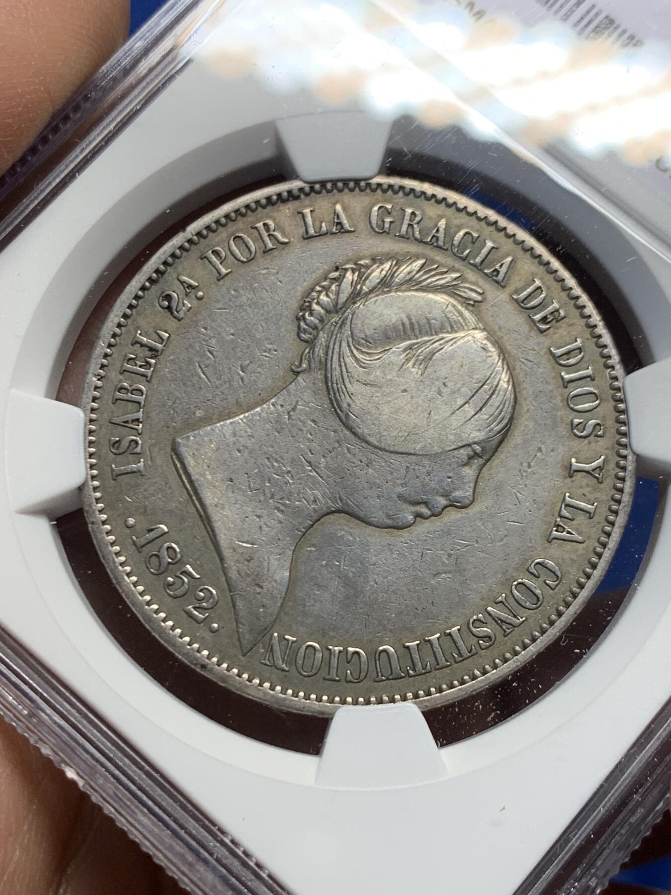 《竞宝斋》第453场 周日，周一 2场连拍 （全场包邮，欢迎送拍） NGC VFD 西班牙 1852年 伊萨贝拉猪头妹 20R 大银币