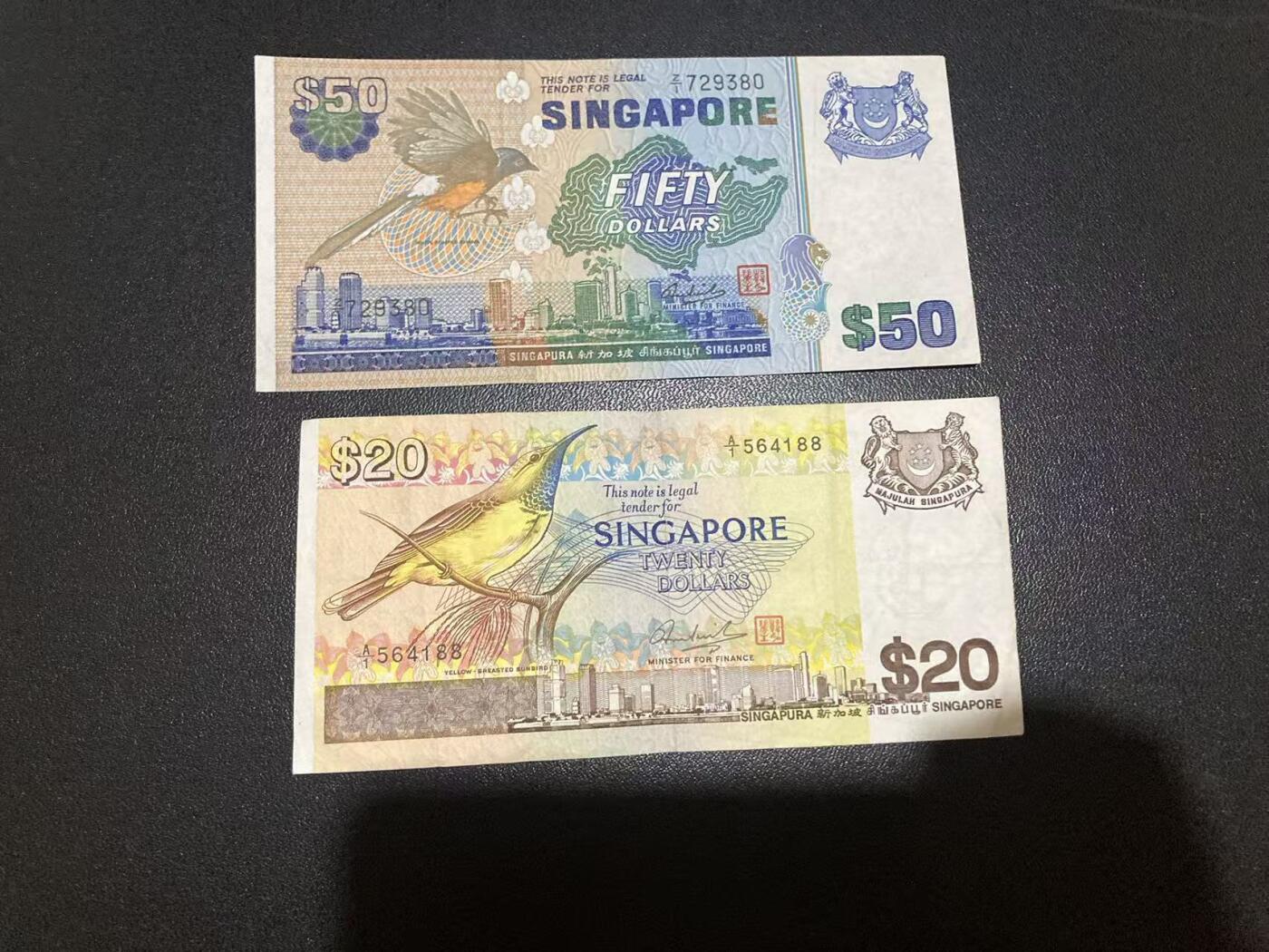 《外钞收藏家》第五百九十八期（2026年新年第一场）（本平台长期征集拍品、欢迎藏友们联系合作） 新加坡鸟版20和50元 2张一起 非全新