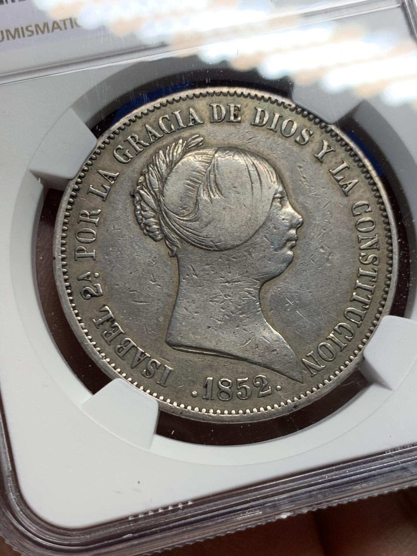 《竞宝斋》第453场 周日，周一 2场连拍 （全场包邮，欢迎送拍） NGC VFD 西班牙 1852年 伊萨贝拉猪头妹 20R 大银币